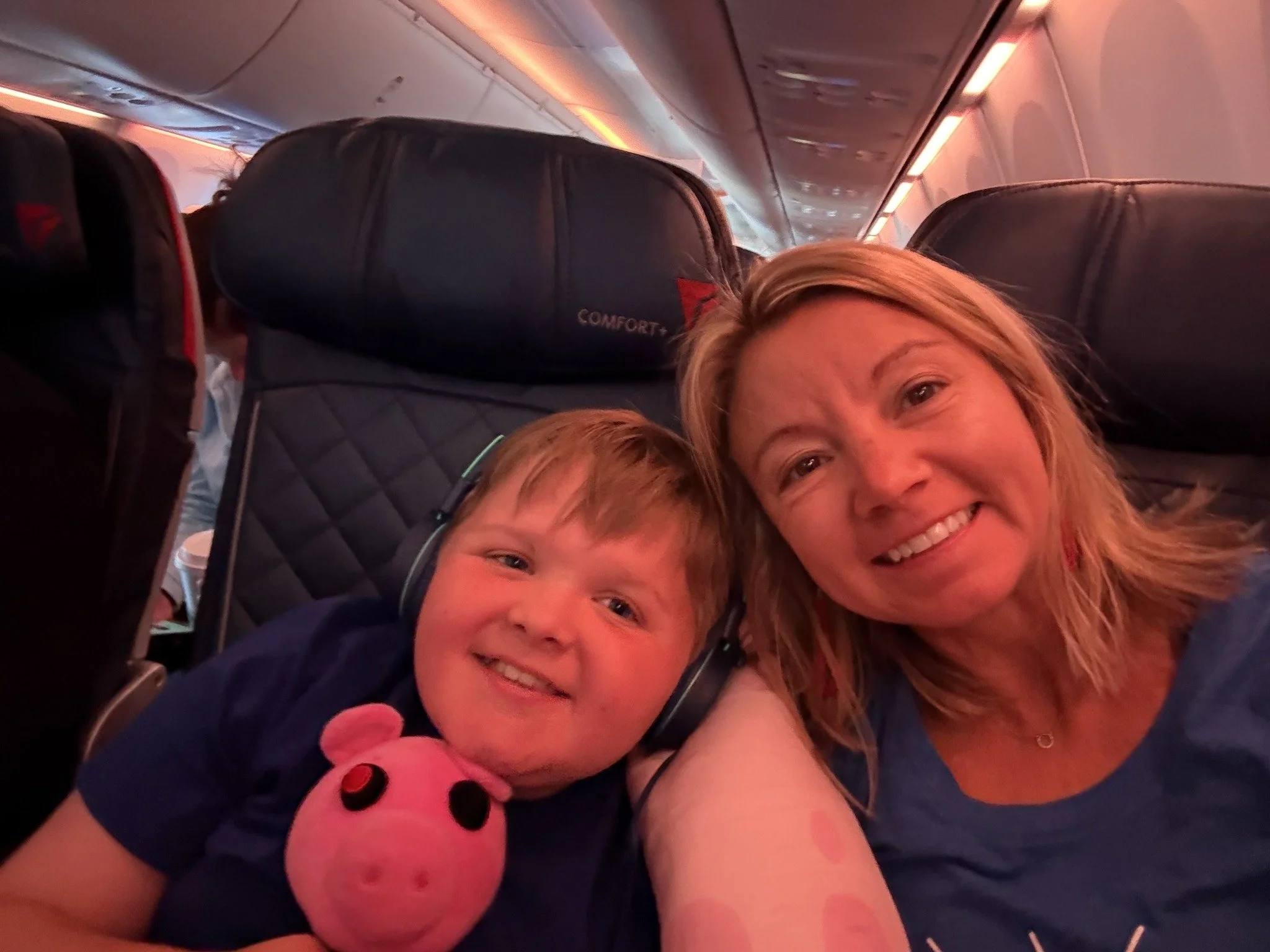 2025-07_reflection_2-week_leave_plane-selfie.jpg