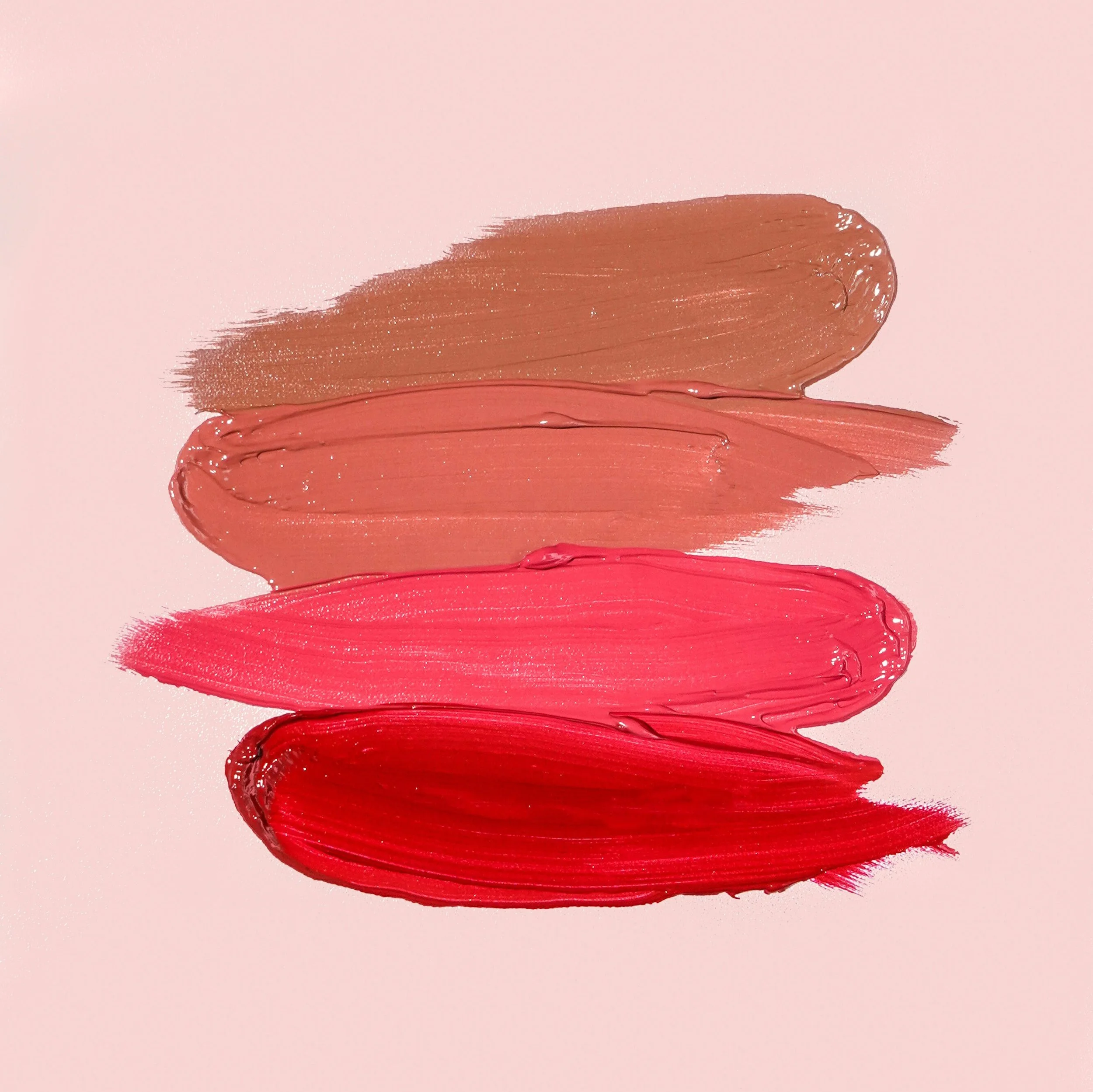 Three lipstick colour swatches in natural and pink tones symbolising diversity and femininity.