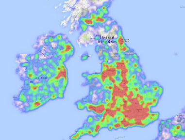 A weather map showing rain intensity over the United Kingdom, Ireland, and parts of Europe with areas in red indicating heavy rainfall, green for moderate, and blue for light or no rain.