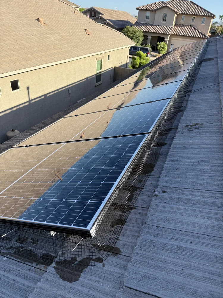 Solar panel bird guard installation