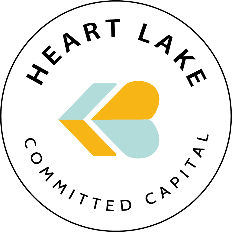 A stylized arrow icon made of three overlapping shapes in light blue and yellow, pointing to the left, with the text "KAR" underneath.