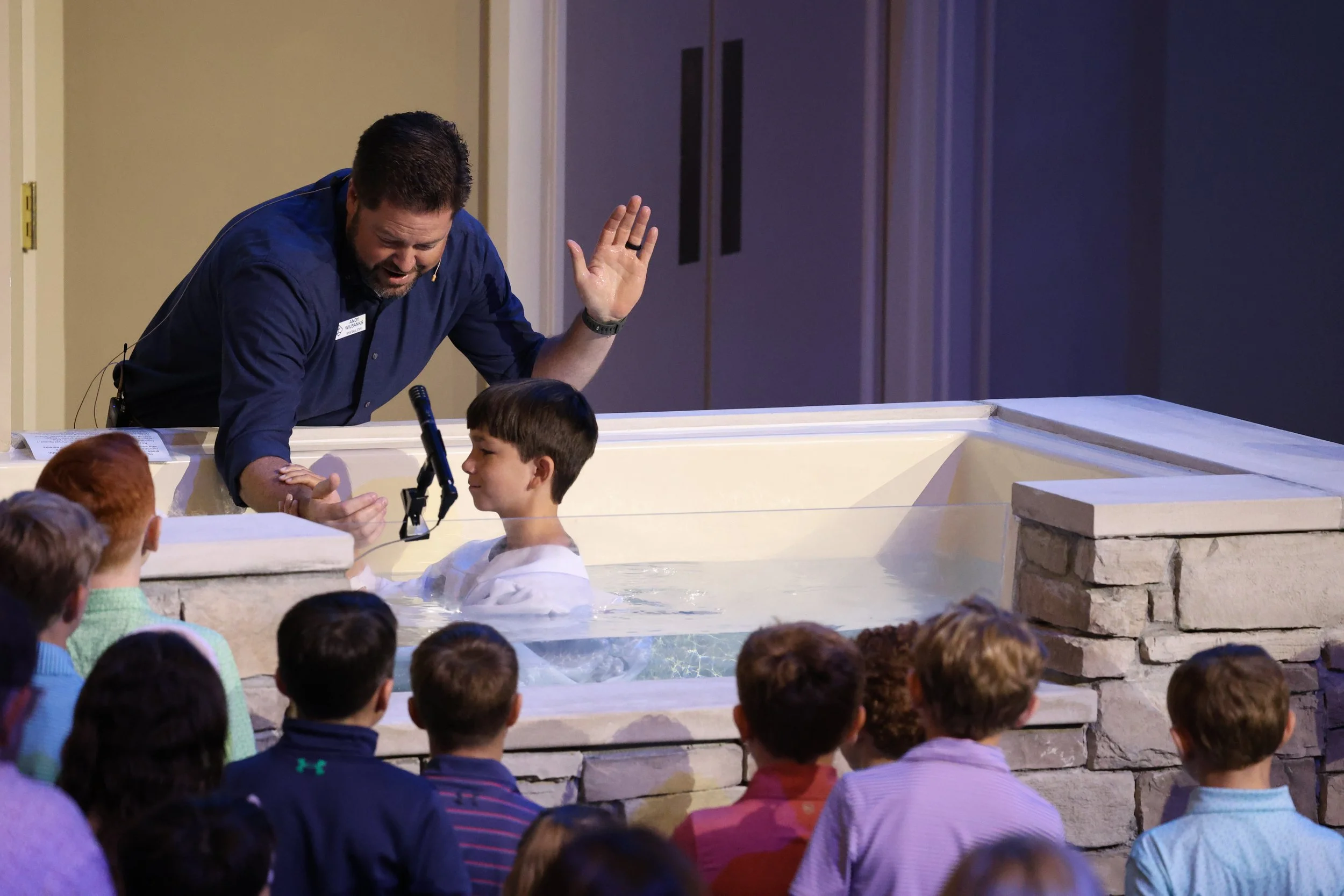 One of our children taking a step in faith through Baptism.