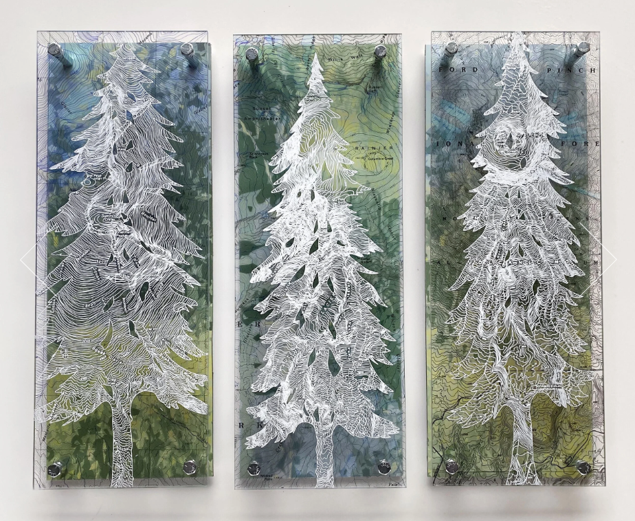 Three glass panels with white tree outline designs against colorful, topographic map backgrounds, each panel mounted with four screws.