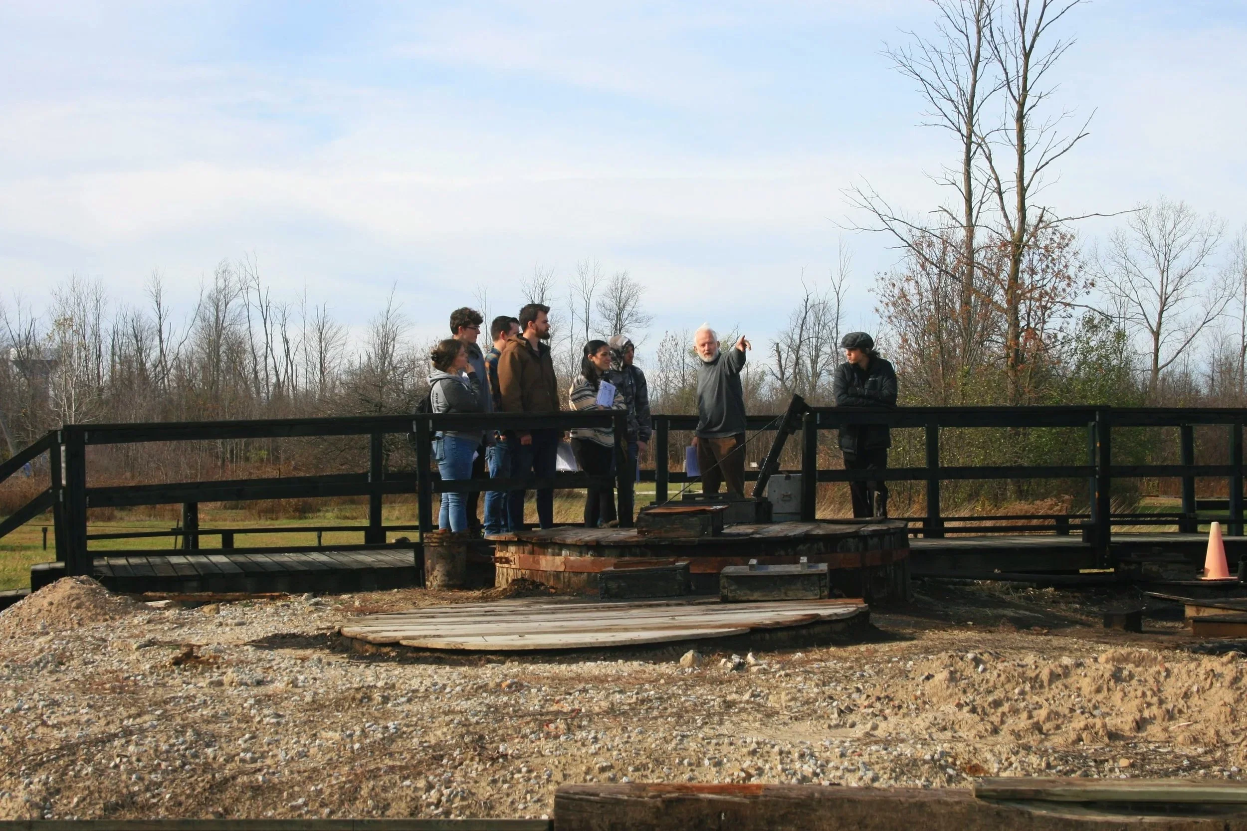 OU+Students+learning+where+oil+in+storage+tank+%28has+metal+band+around+it%29+comes+from.jpg
