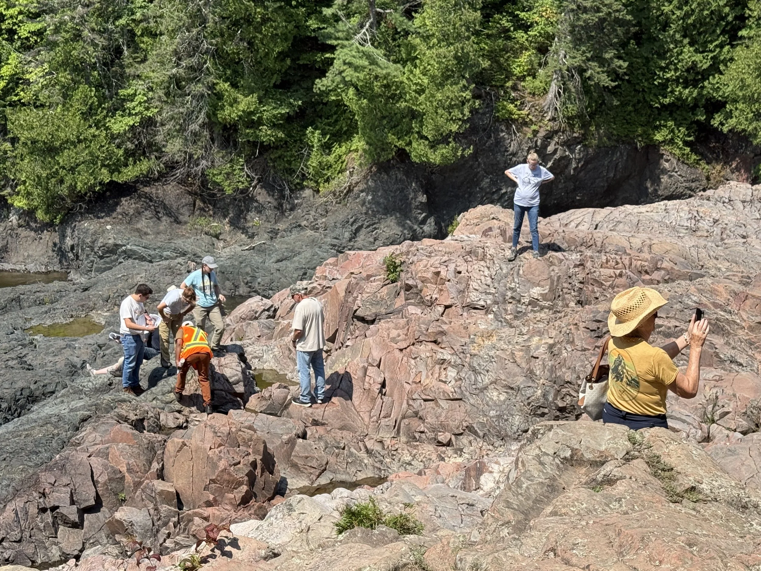 OU students examining rocks at Chippewa Falls.jpeg