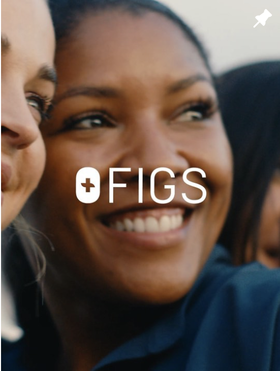 Close-up of smiling woman with dark hair and dark skin, with part of another person's face visible on the left, and the logo and text 'FIGS' overlaid.