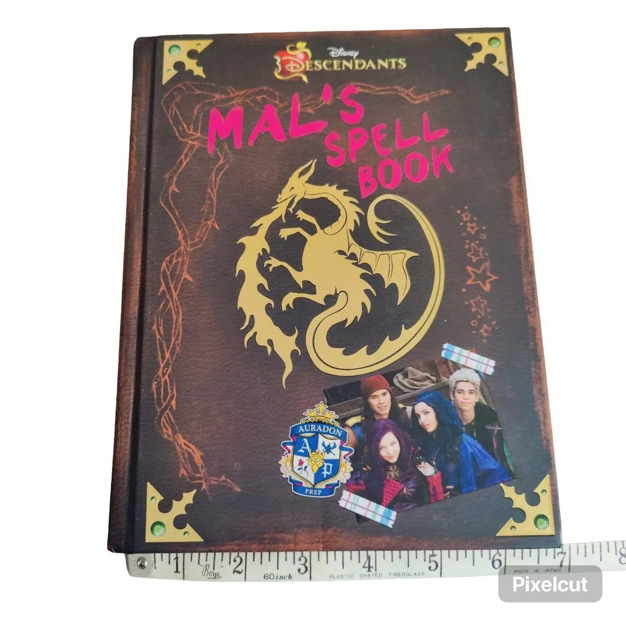 Disney's Descendants: Mal's Spell Book by Disney Books First Edition July 2015
