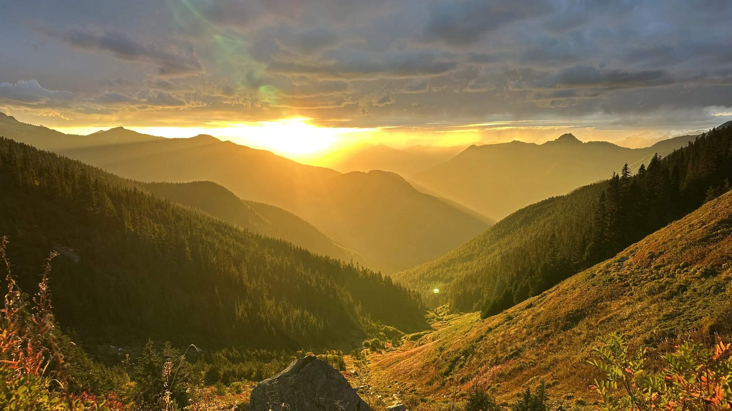 Calming nature vista showing sunset in the mountains
