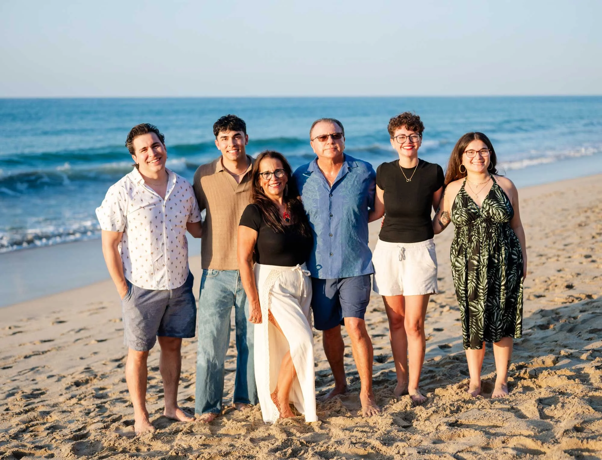 Paty with her family at the beach
