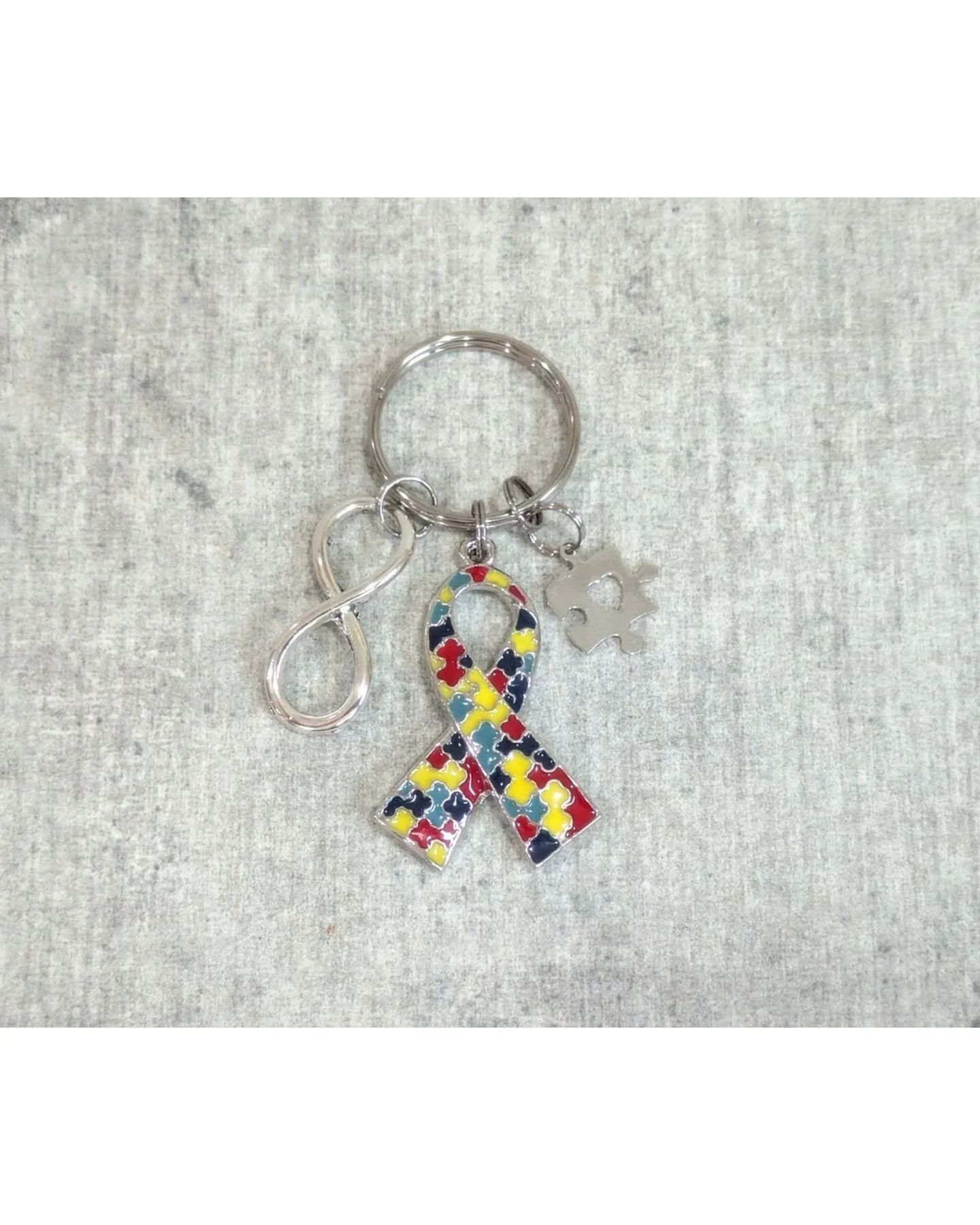 Celebrate the beauty of individuality with our Autism Awareness infinity Keychain. This handcrafted piece is not just a stylish accessory; it&rsquo;s a powerful symbol of support and understanding for the autism community.
Click on the links in the b