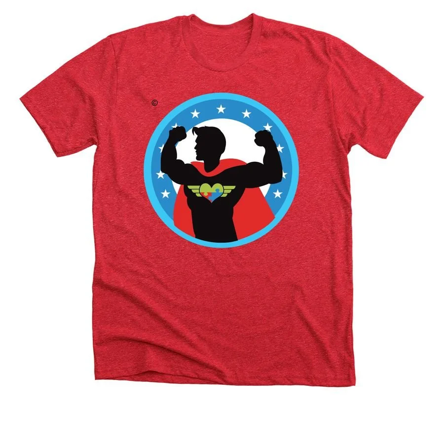 Red T-shirt with graphic of a superhero figure with flexed arms, wearing a cape and a chest emblem, inside a blue circle with stars.