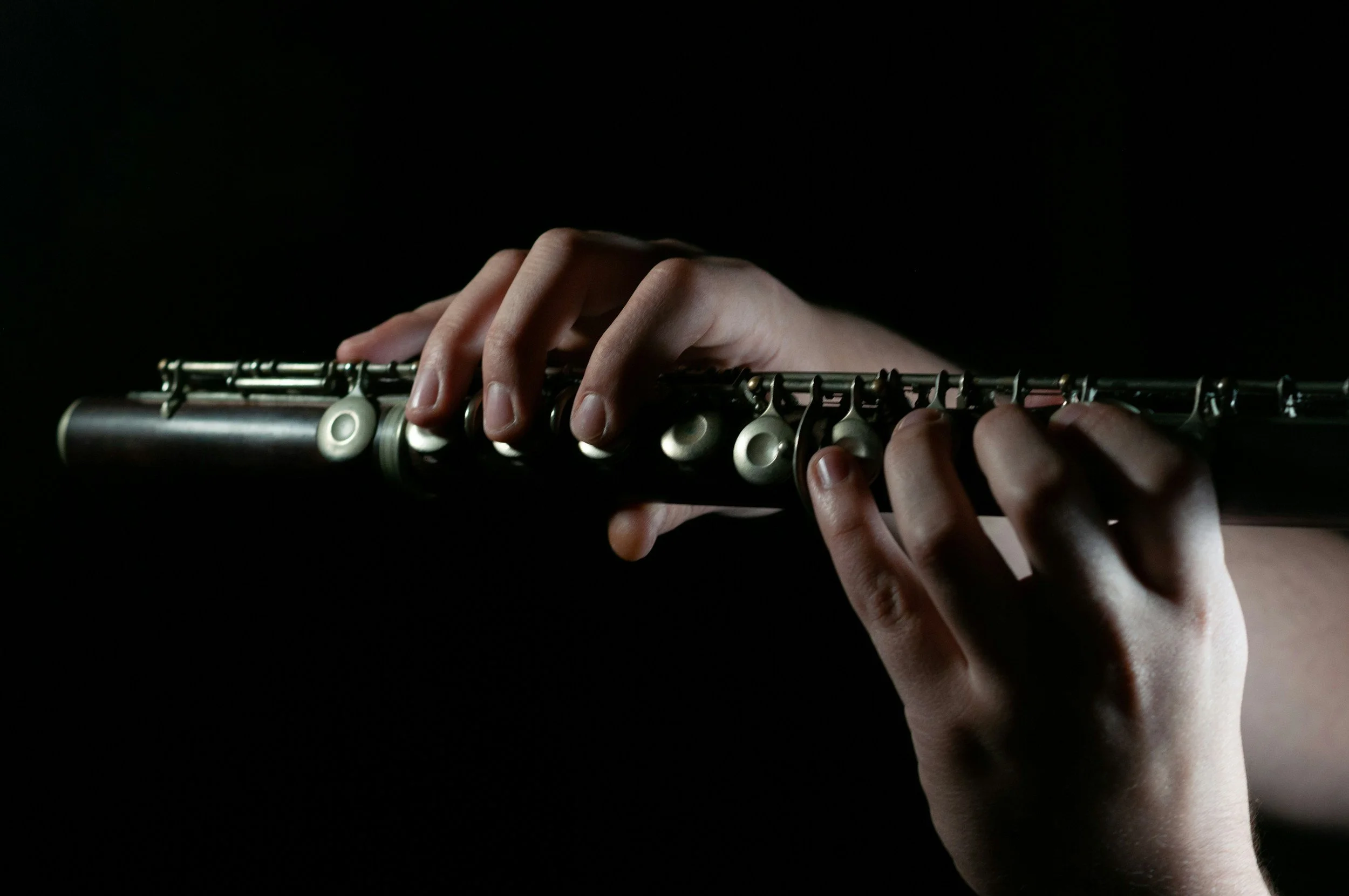 Geometric drawing of an outline square with sections divided by vertical, horizontal, and diagonal lines.