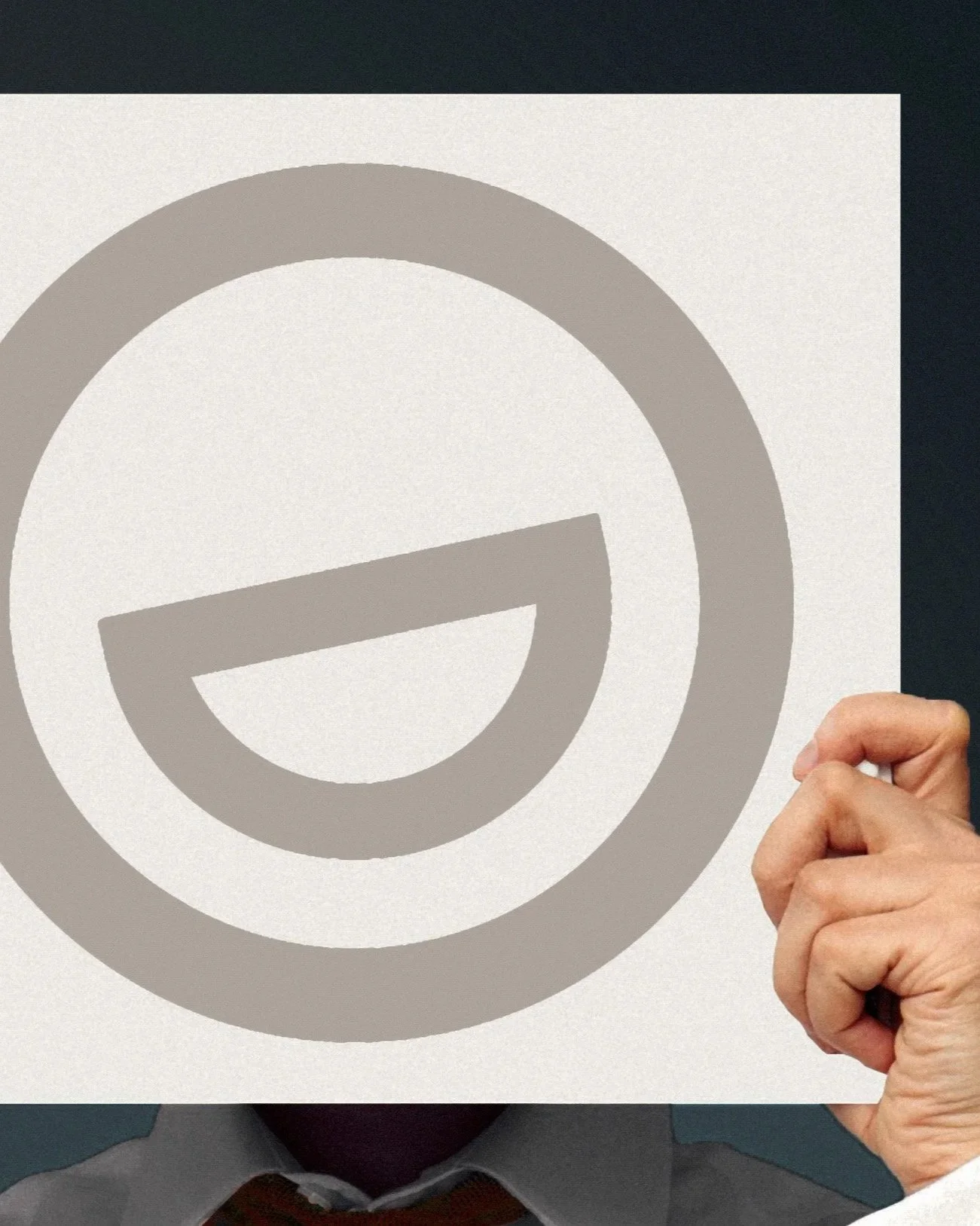 Hand holding a white sign with Morgan Gate Dental logo