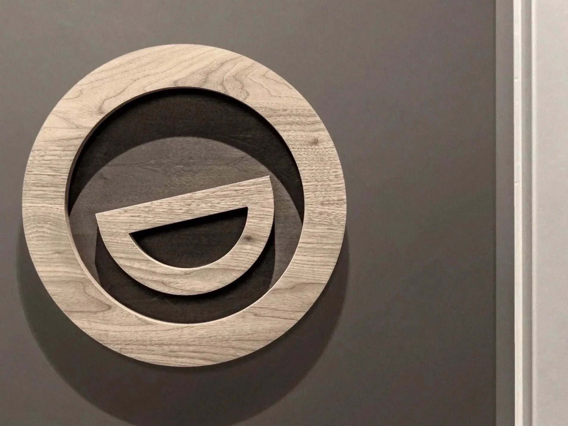 Wooden Morgan Gate Dental logo. Family Dentist in South Surrey British Columbia