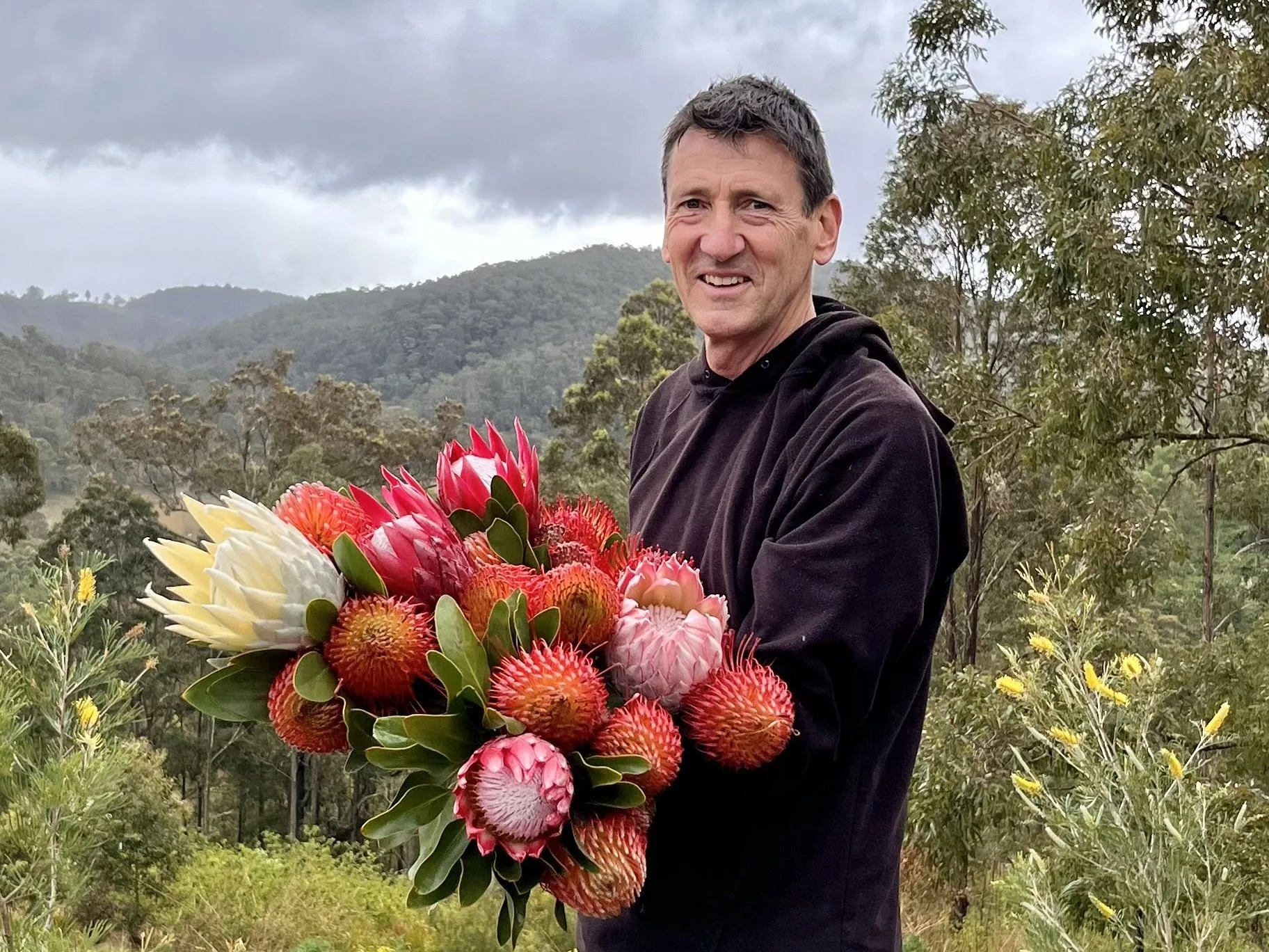 Graham Creed displaying his prized Proteas.