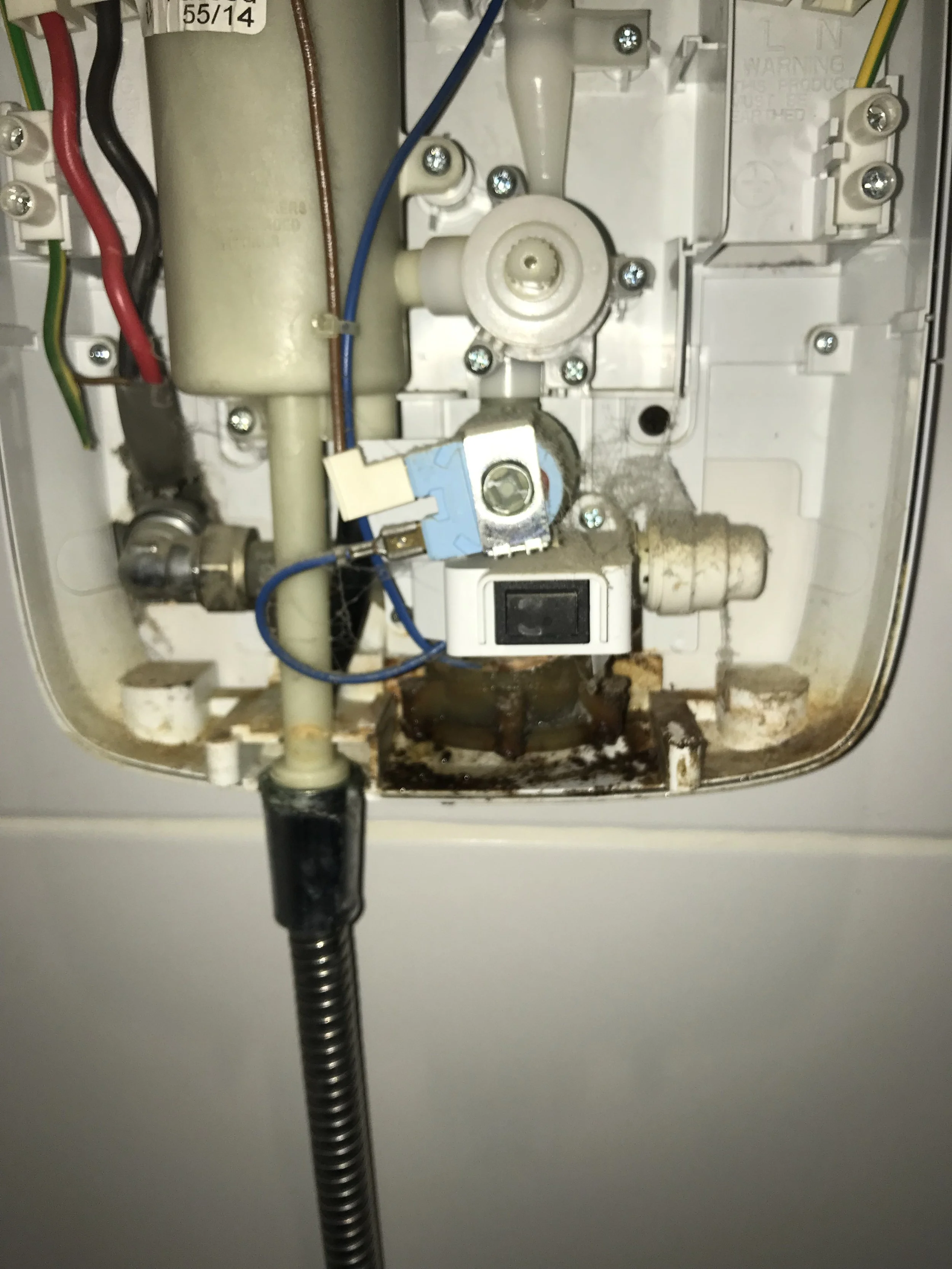 Faulty electric shower wiring identified during repair in Cheadle