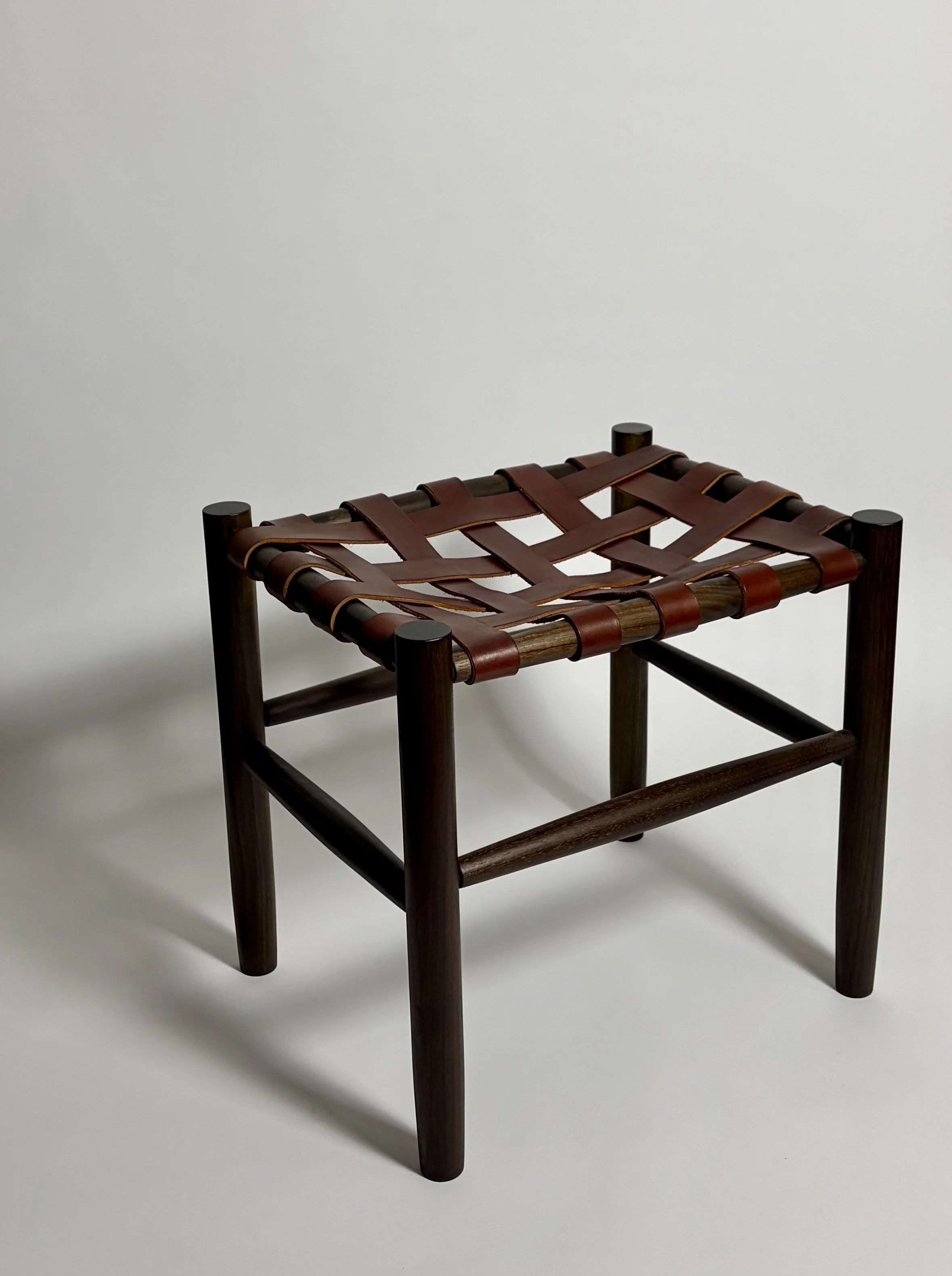 Lattice stool, oxidized walnut and leather | $800