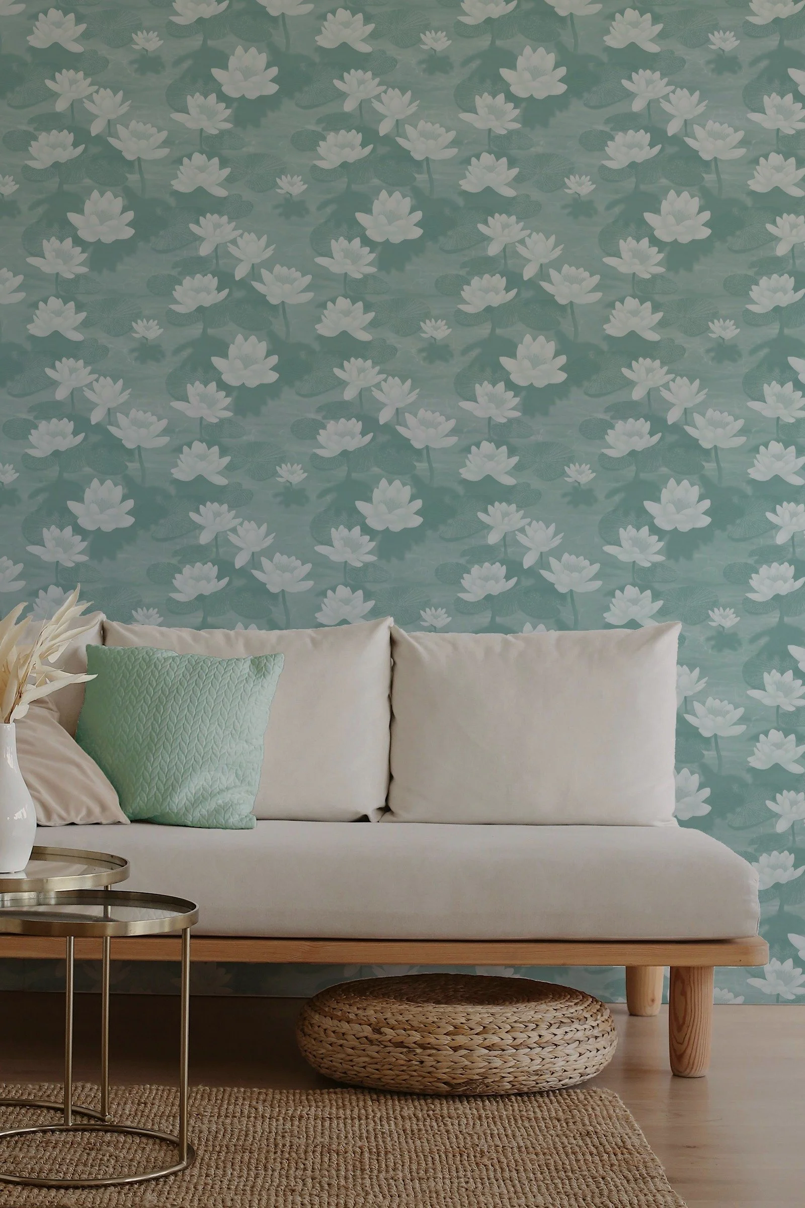 Lotus Blossom Drift by Aitch Jay Designs — a teal lotus‑flower repeat used as living‑room wallpaper, emphasising the calm, botanical design.