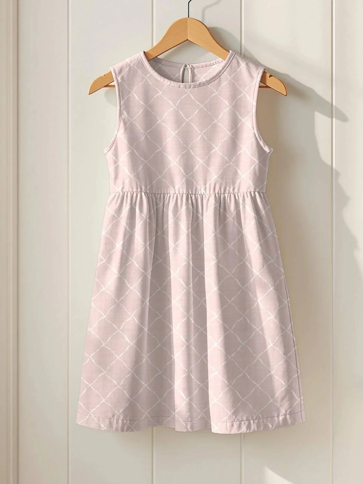 Ribbon Lattice by Aitch Jay Designs — light pink dress with a subtle diamond‑lattice repeat, showcasing a soft geometric pattern perfect for modern summer fashion.