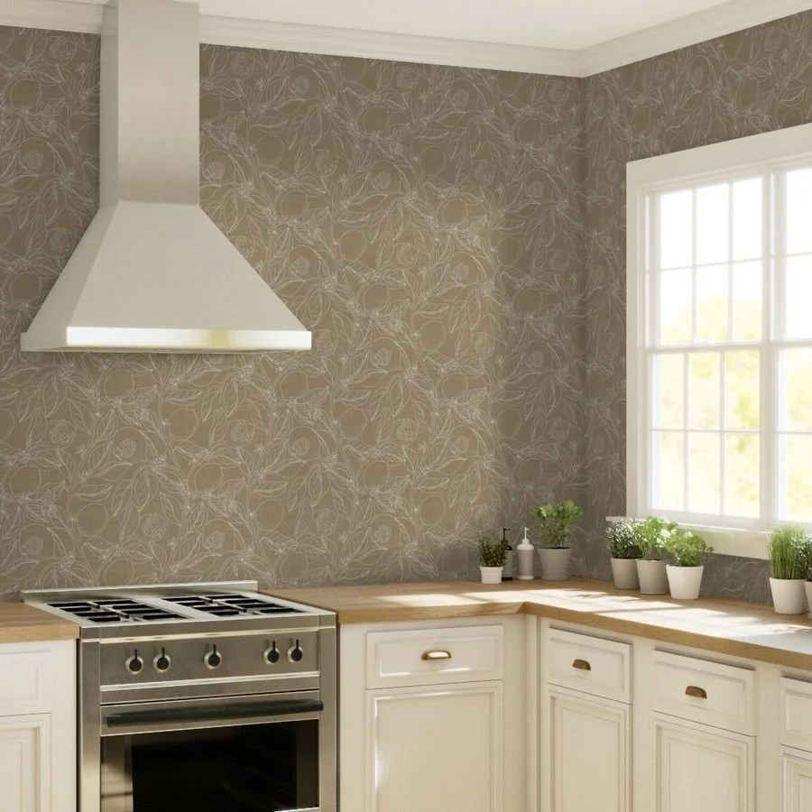 Kitchen with white cabinets, wooden countertops, a stainless steel stove, a white range hood, a window with sunlight, and potted herbs on the windowsill.