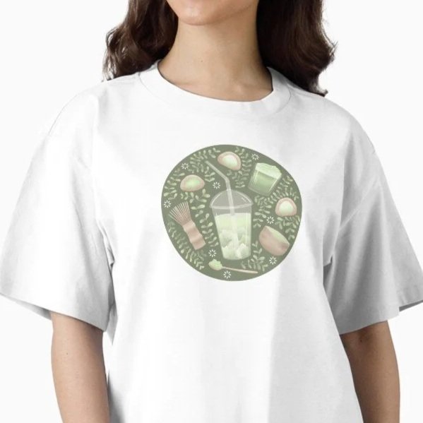 A person is wearing a white T-shirt with a circular design featuring various tea-related items, including a tea cup, a tea bag, and a steaming beverage.