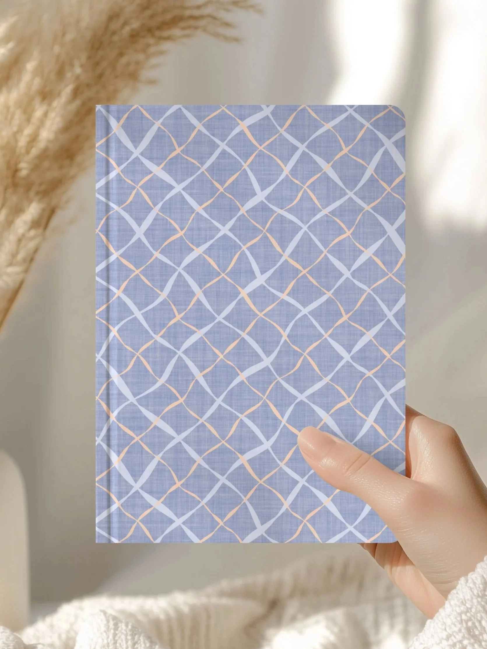 Ribbon Lattice by Aitch Jay Designs — blue notebook cover with intersecting curved‑line lattice design, blending modern geometric aesthetics with a soft, creative feel.
