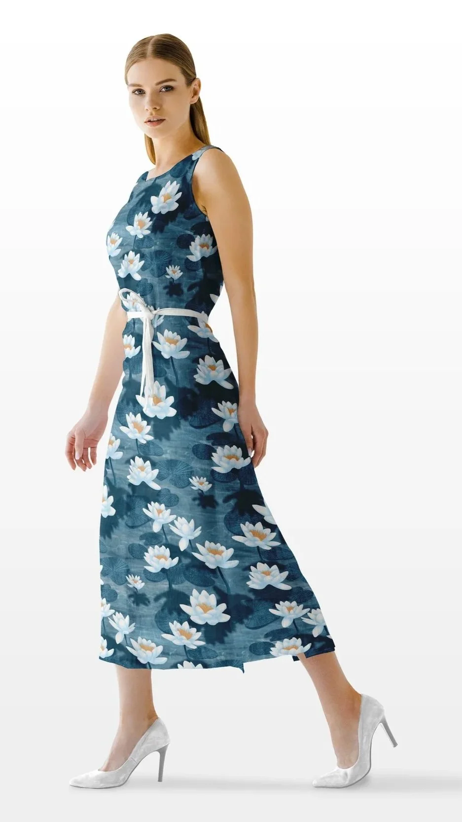 Lotus Blossom Drift by Aitch Jay Designs — a flowing blue dress featuring a white lotus floral repeat, showcasing the elegant, nature‑inspired pattern.