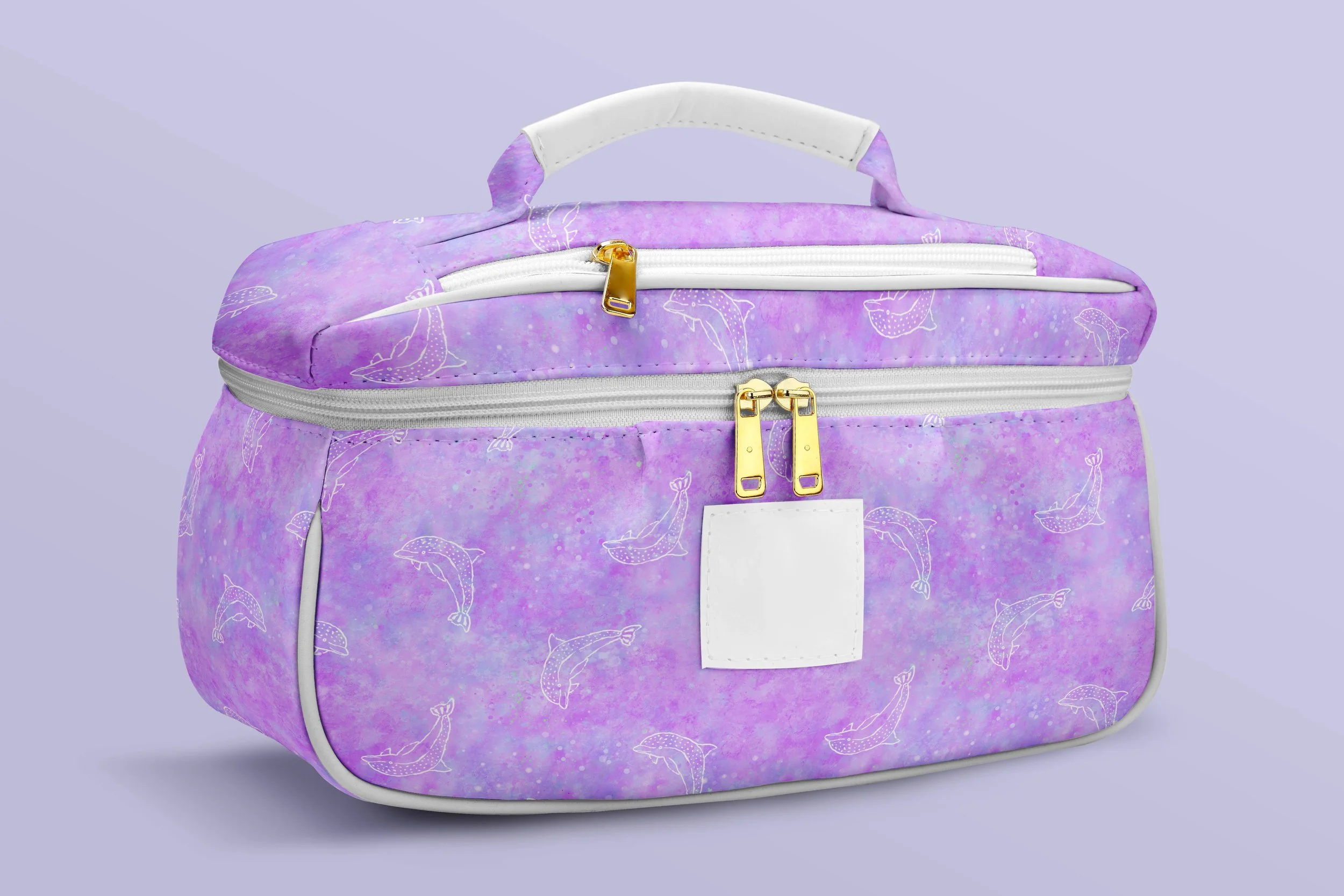 A purple backpack with white whale illustrations, gold zippers, and a white handle, set against a light purple background.
