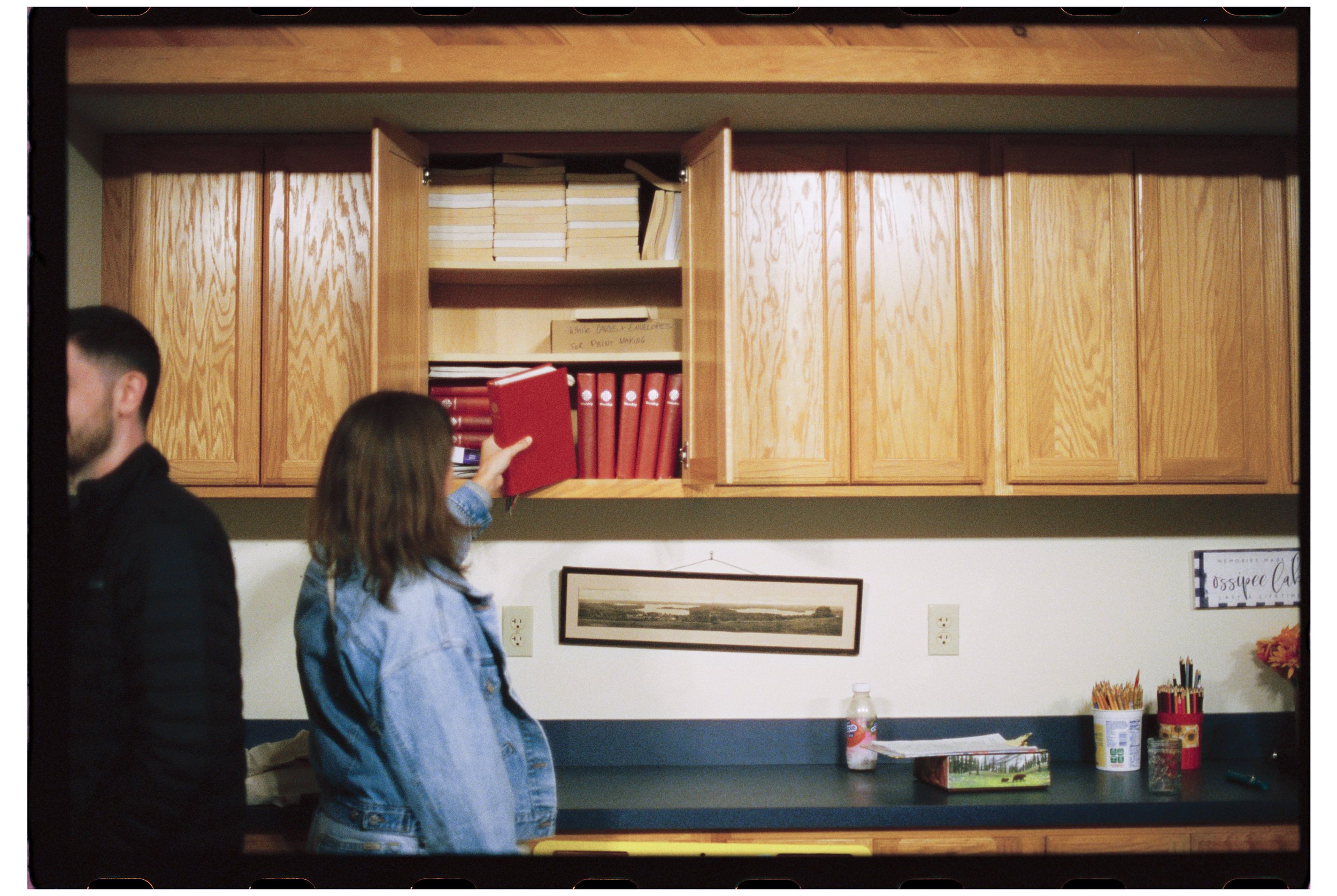 Becca and hymnals. Camp Calumet. Freedom, NH. October 2025.