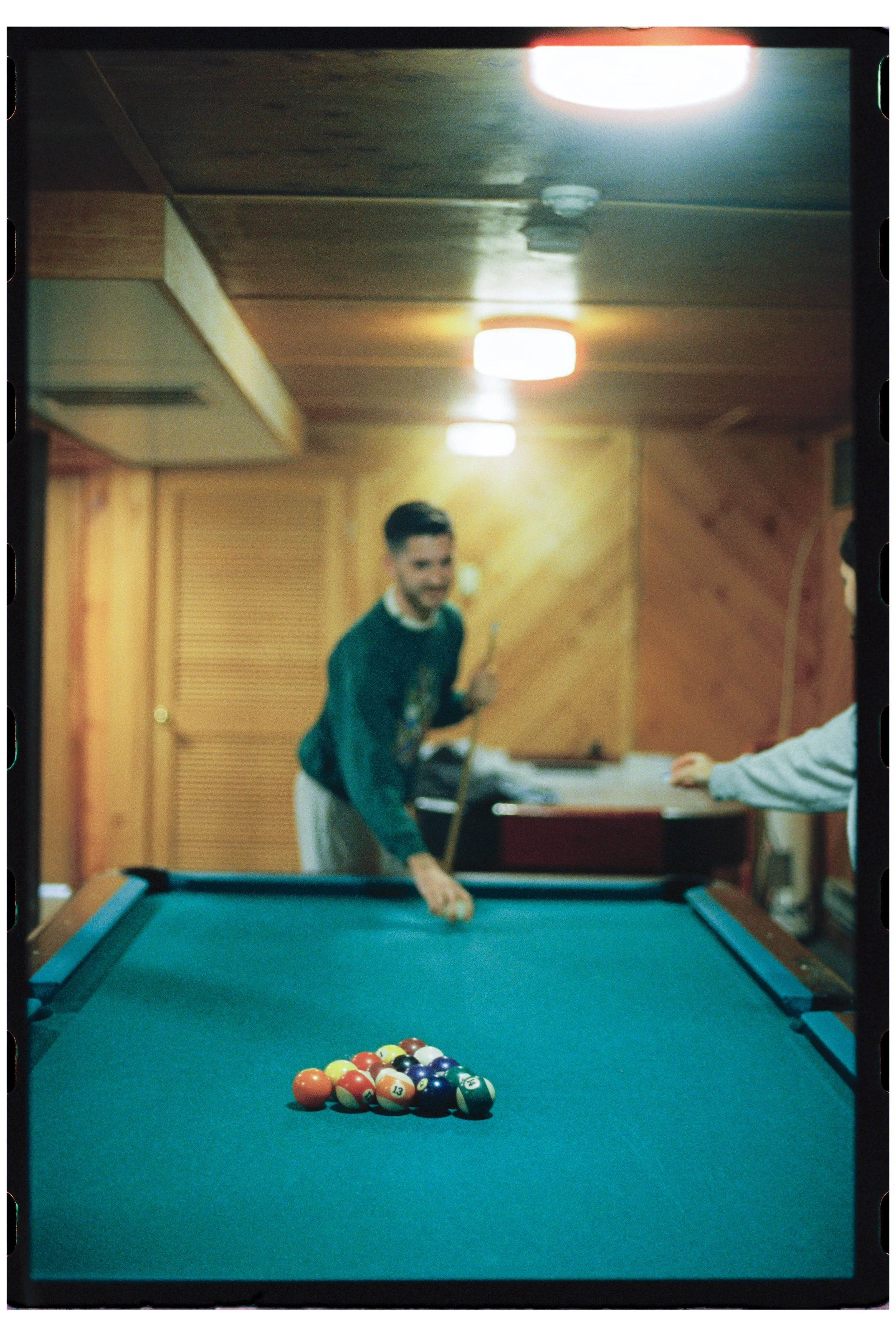 Ty playing pool at Camp Calumet. Freedom, NH. October 2025.