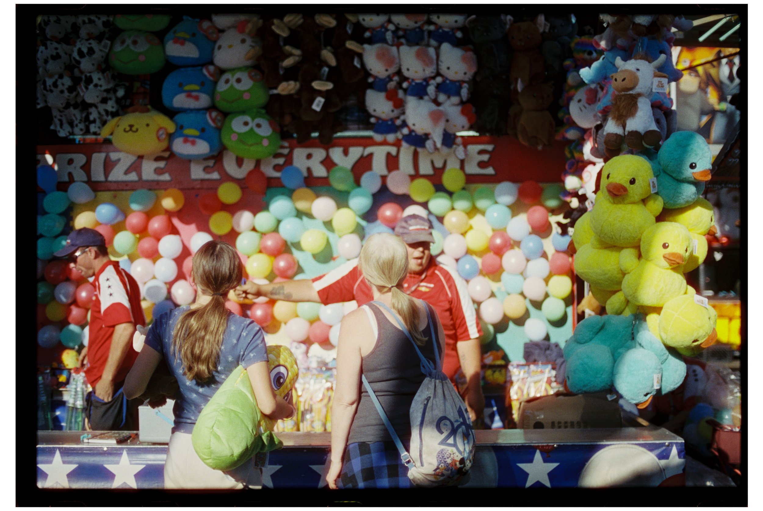 Fryeburg Fair with Becca, Ty, and Zac. Fryeburg, Maine. October 2025. Nikon F3. CineStill 400D.