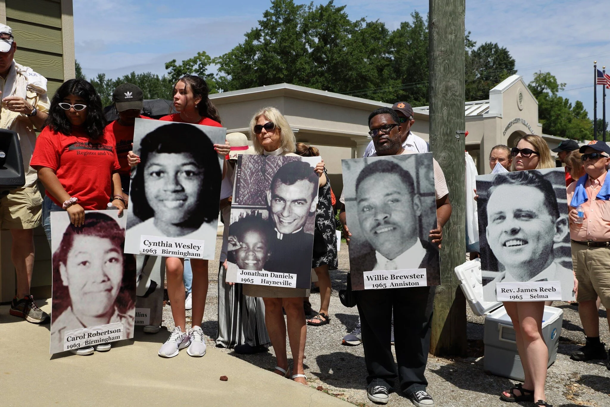 Posters of Jonathan Daniels and other martyrs from the Civil Rights Era in Alabama. Photograph taken in 2019 at the site where Daniels was martyred. Courtesy of the Episcopal Diocese of Alabama.