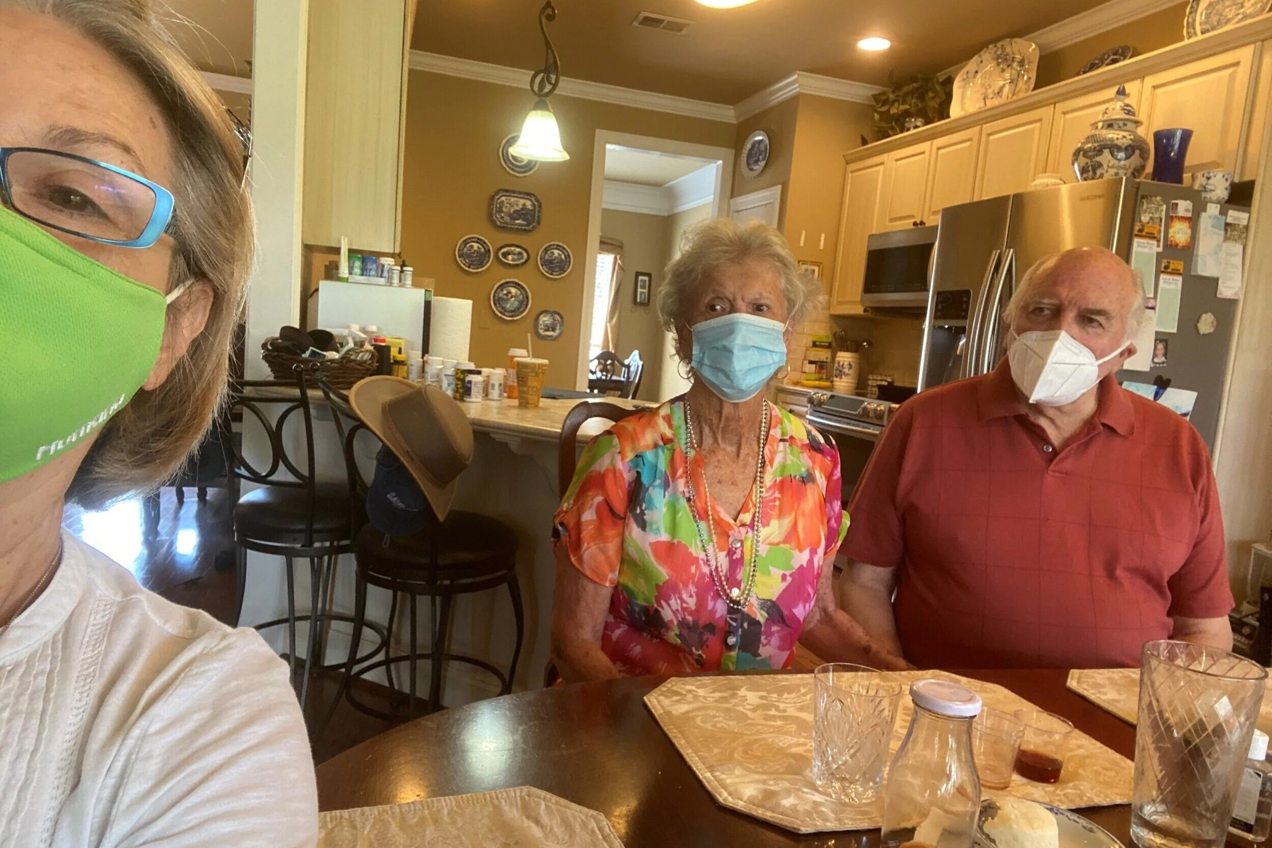 Deacon CJ with Claudia and Chip Maxwell in their home, Summer 2020.