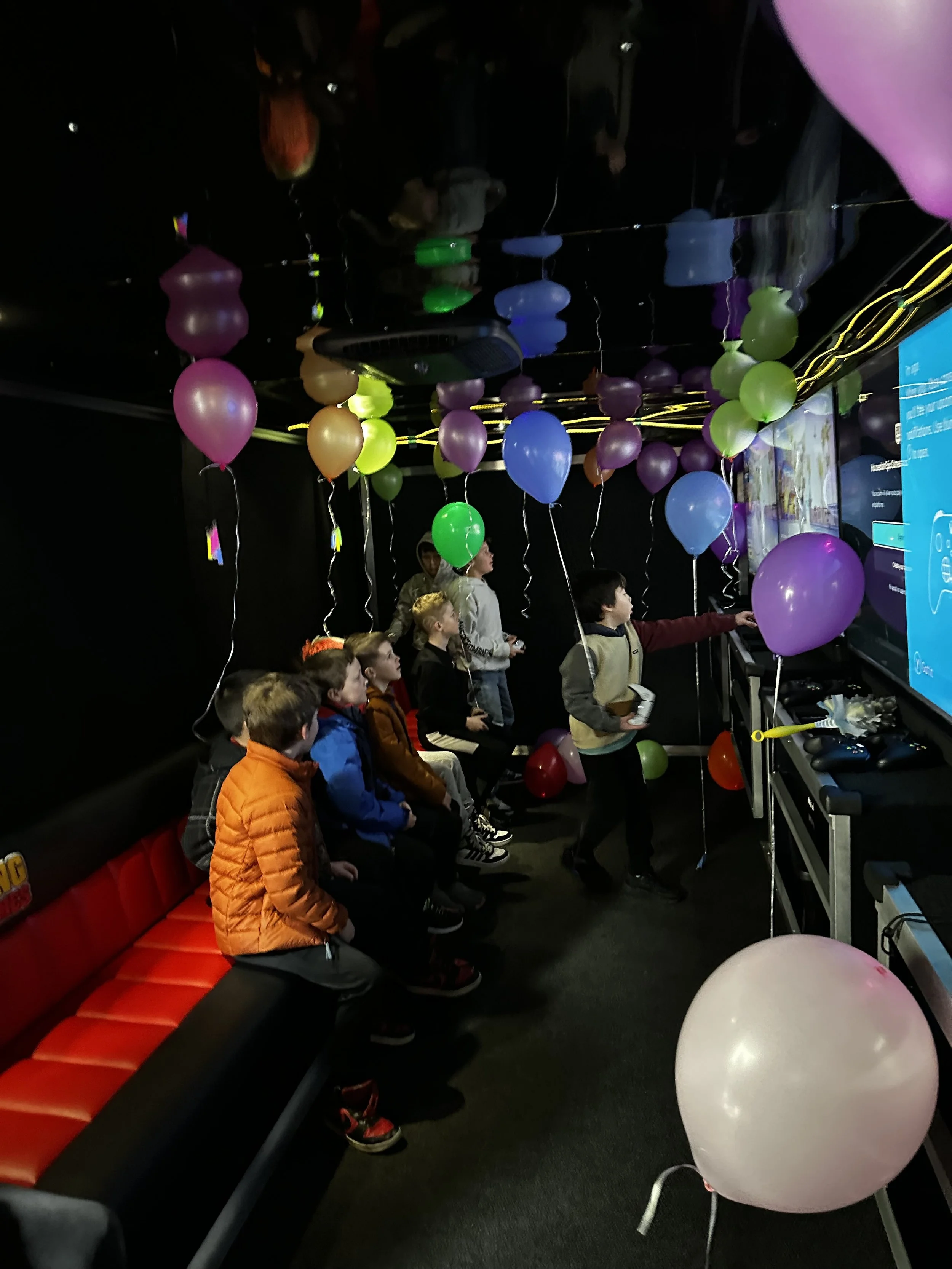 Kids Playing Video Games at a Community Event in Indianapolis