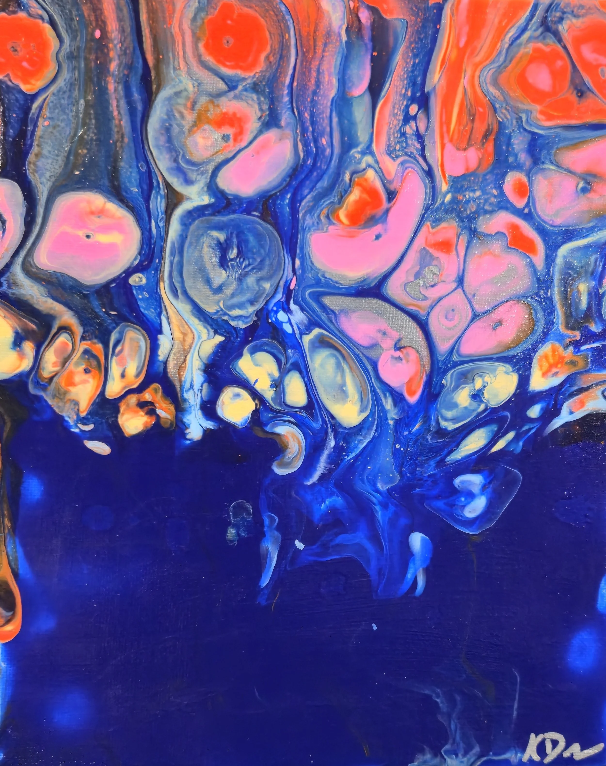 Abstract painting with swirling colors in pink, orange, yellow, and blue, with a dark blue background at the bottom.