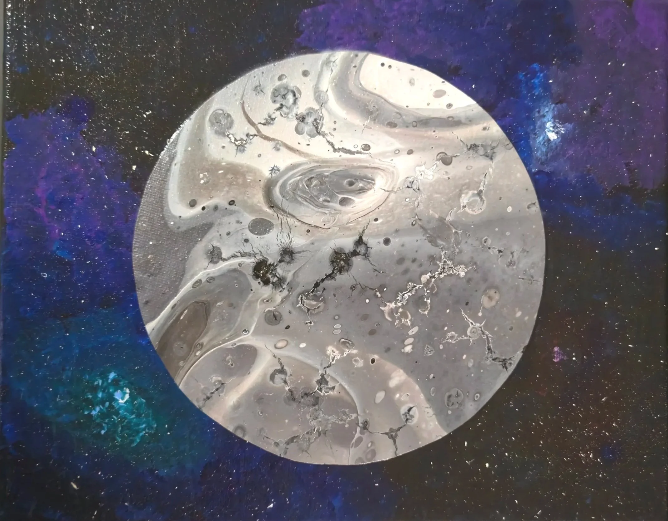 Abstract painting of a galaxy or nebula with a round moon-like shape in the center. The background features black, purple, and blue colors with white speckles resembling stars.