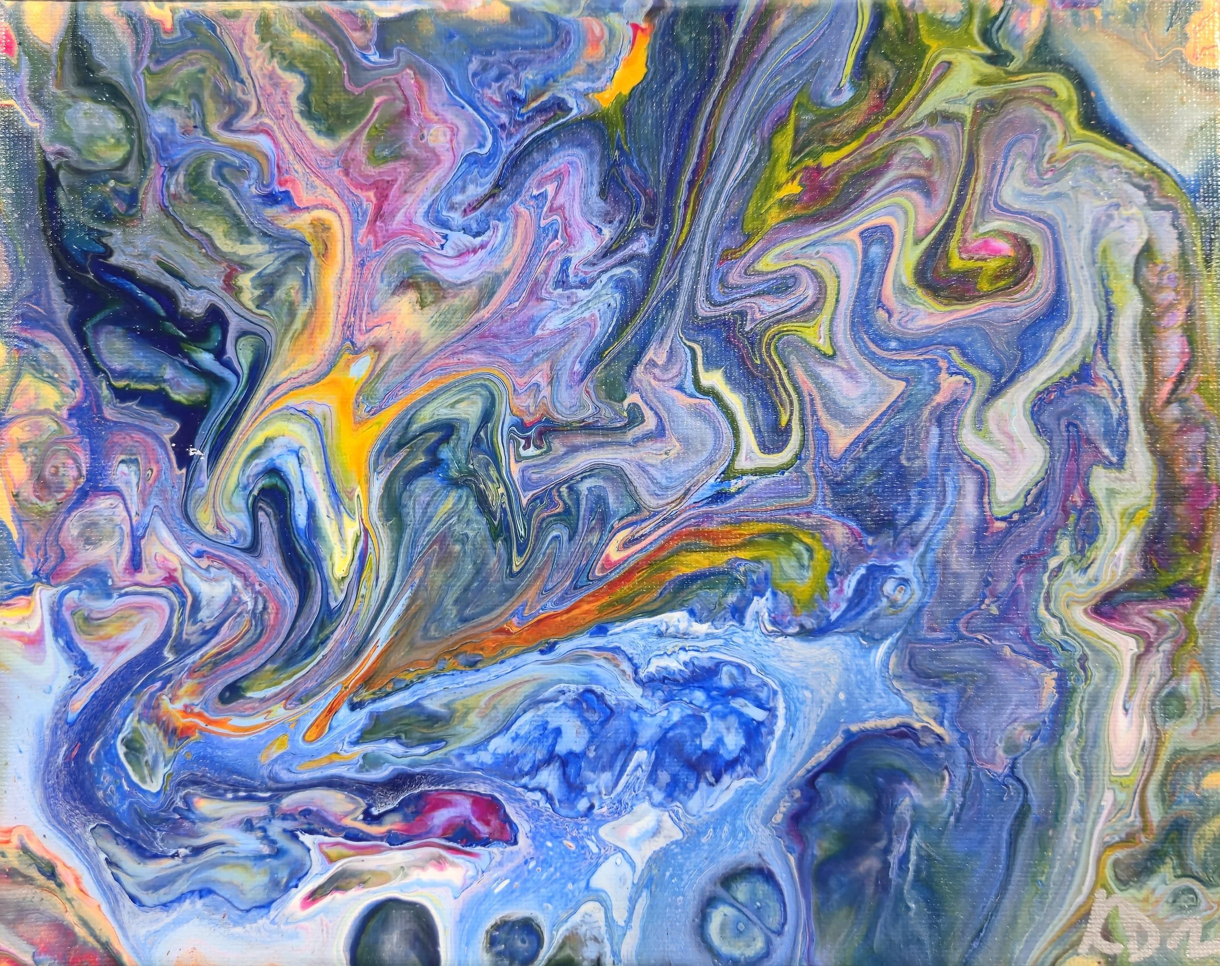 Abstract swirl of vibrant colors including blue, yellow, pink, and purple with fluid, flowing patterns.