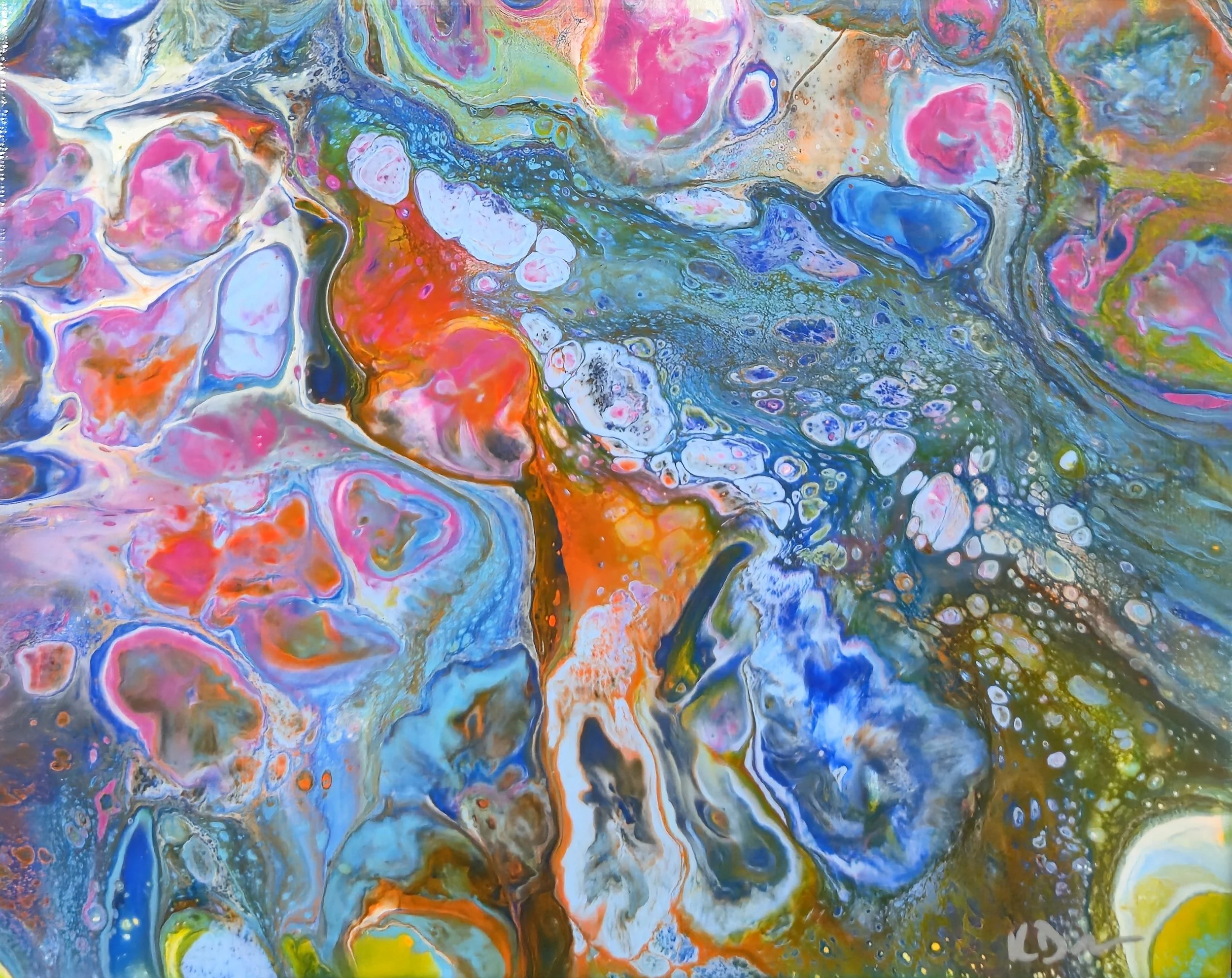 A colorful abstract painting with swirling patterns and blobs in pink, blue, green, orange, yellow, and white.