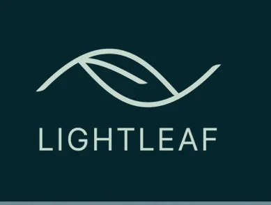 Logo featuring two stylized leaves with the text 'LIGHTLEAF' underneath