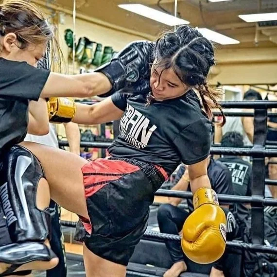 Image of Coach Canny at a Muay Thai training session