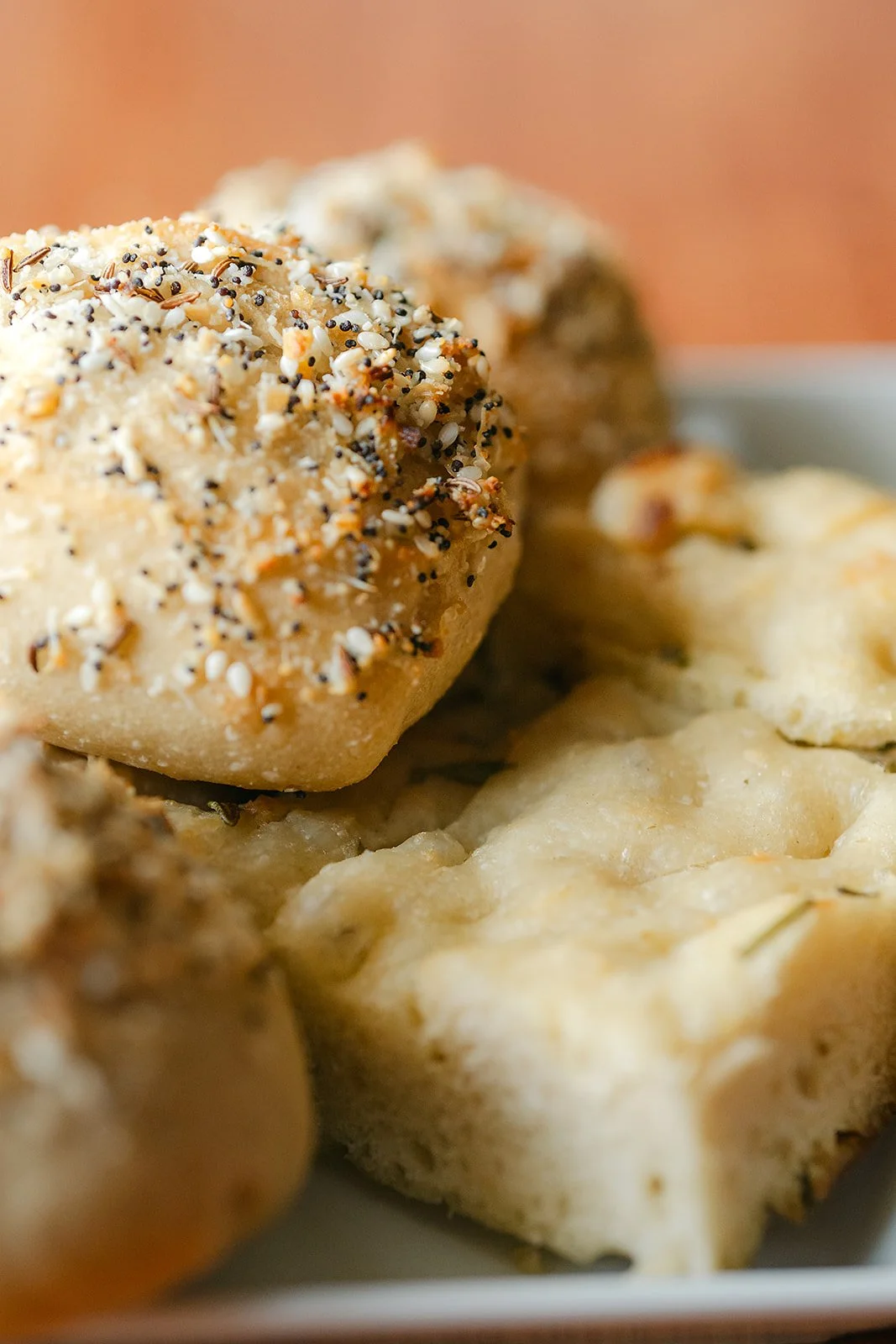 Dinner rolls and focaccia bread.