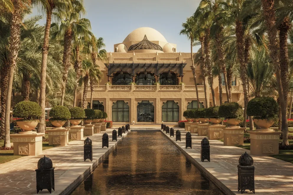 A grand Middle Eastern or North African style building with domes