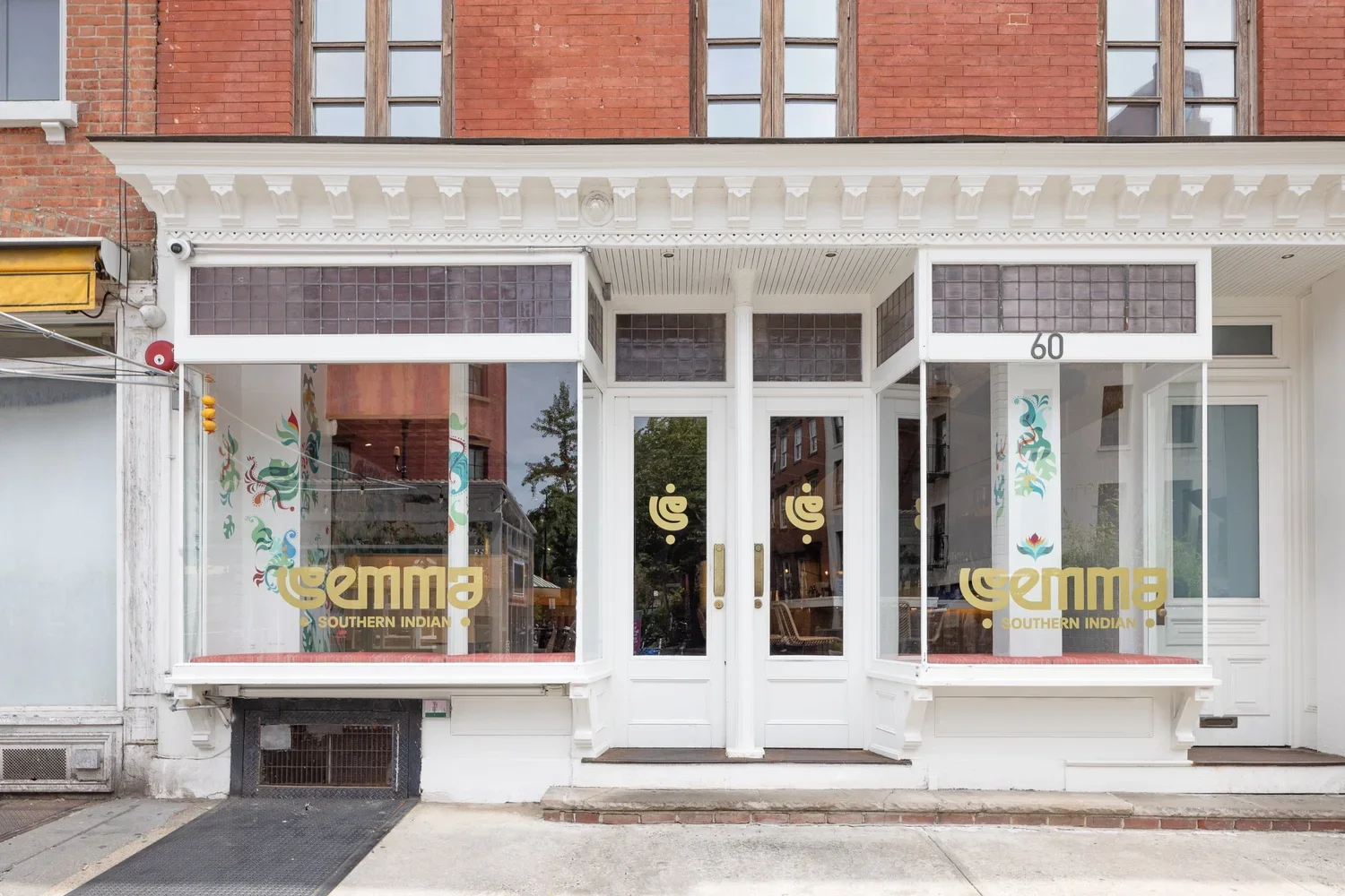 The storefront of Gema Southern Indian restaurant, displaying the restaurant's name and logo.
