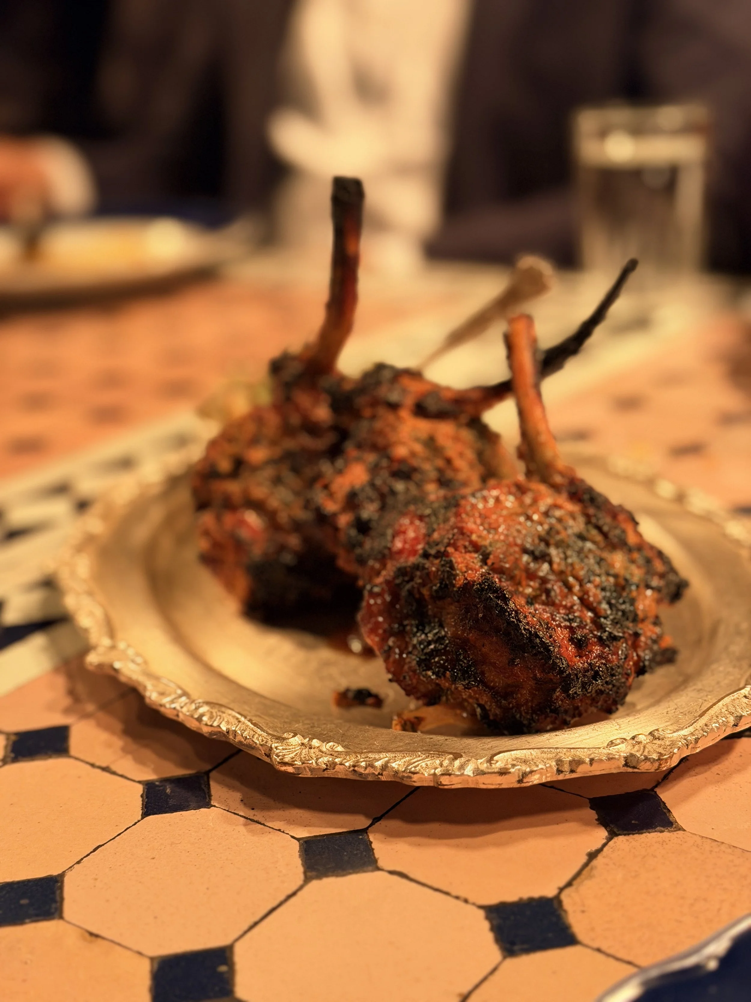 desi food reviews - Close-up of 2 beautifully charred lamb chops with seasoned meat