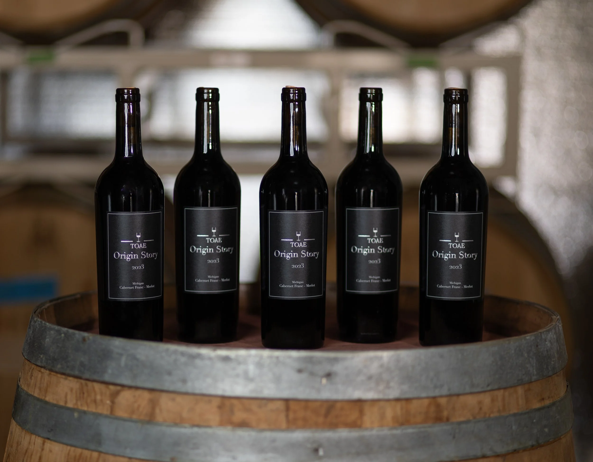 Wine bottle with the word TOAE Origin Story