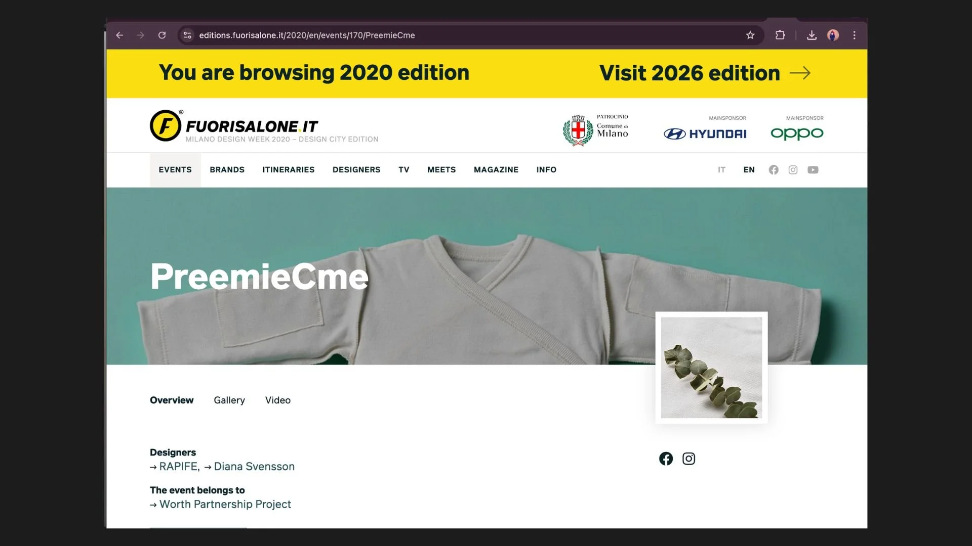 Screenshot of a website page for FUORISALONE IT, showcasing a design event featuring a white baby outfit and a small object resembling a plant or a craft item. The header contains navigation links and sponsor logos, with a yellow banner indicating br