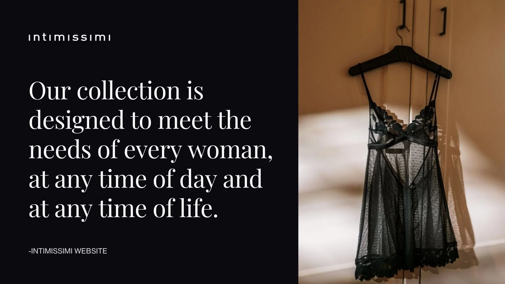 A black lace lingerie slip hangs on a black hanger against a wooden door with a shadow cast on the wall.