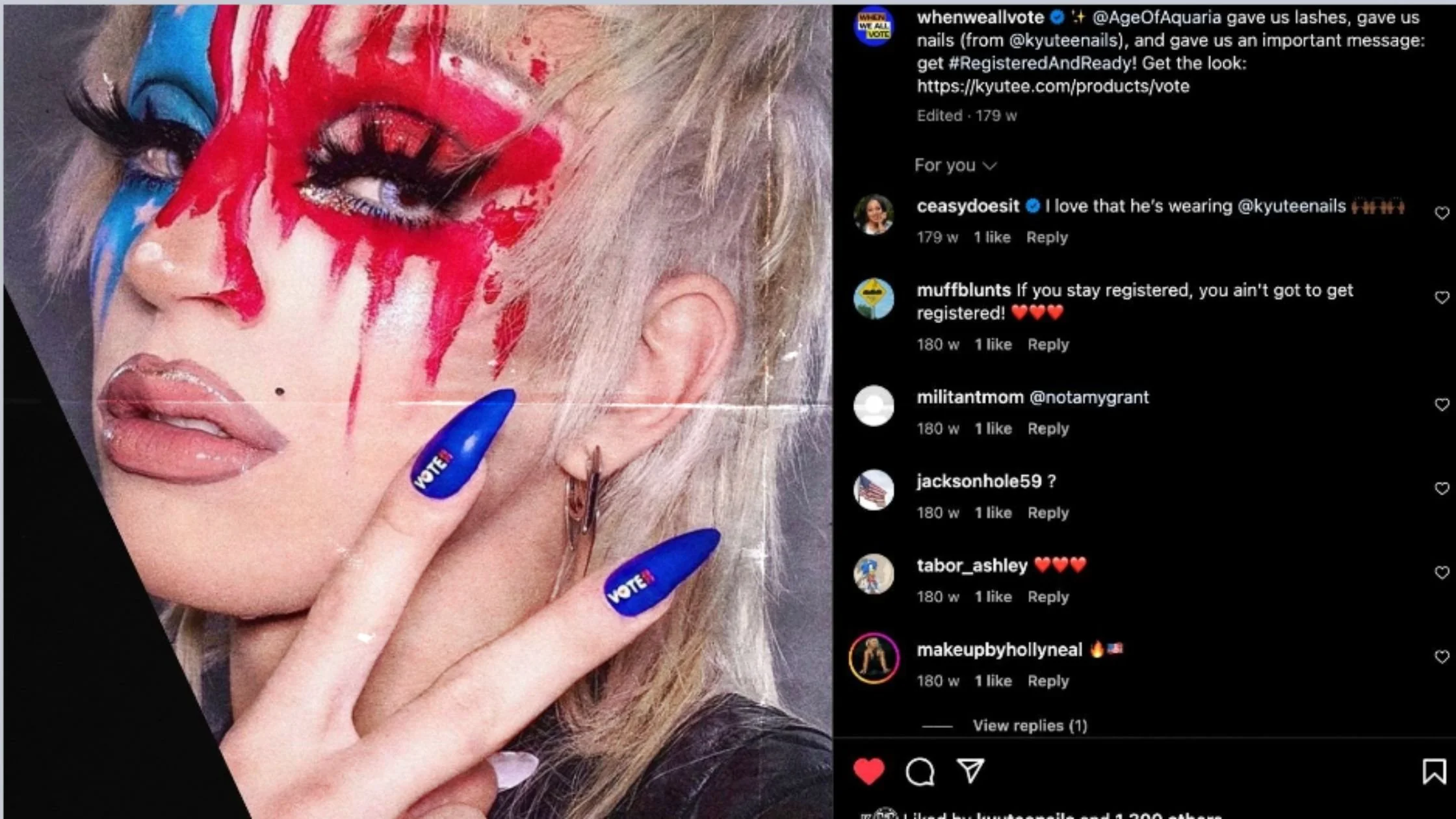 A woman with bold red, blue, and white makeup resembling a flag, dramatic false eyelashes, glossy lips, and platinum blonde hair. She has blue false nails with a 'VOTE' sticker and is wearing a small hoop earring.