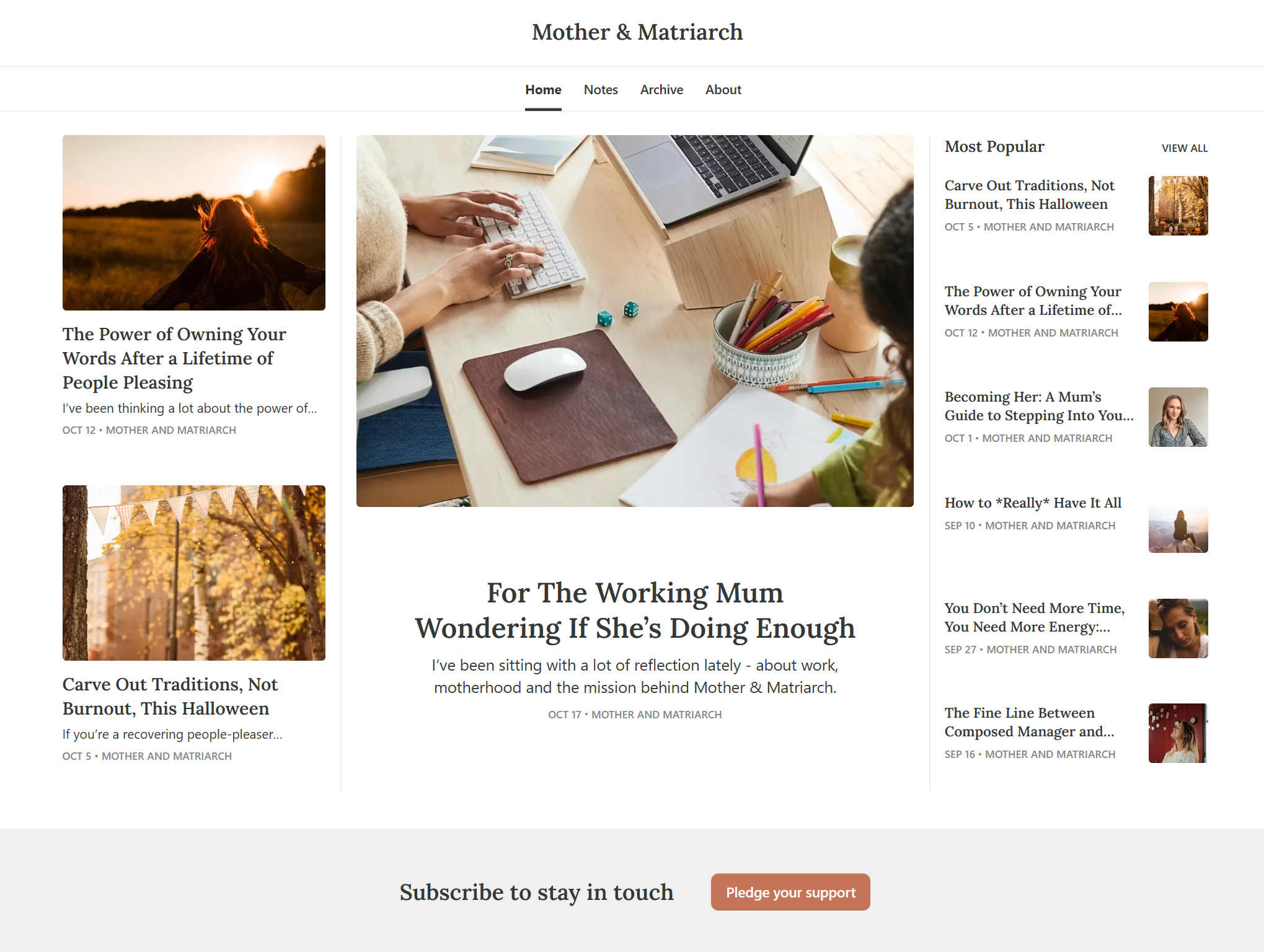 Screenshot of a blog website called 'Mother & Matriarch'. The page shows a main section with a large header image of a workspace with a laptop, mouse, notebook, pens, and a child's hand drawing. The main blog post title is 'For The Working Mum Wondering If She's Doing Enough' and the subtitle mentions reflecting on motherhood and work. To the left and right of the main post, there are smaller blog post previews with images, titles, and dates.