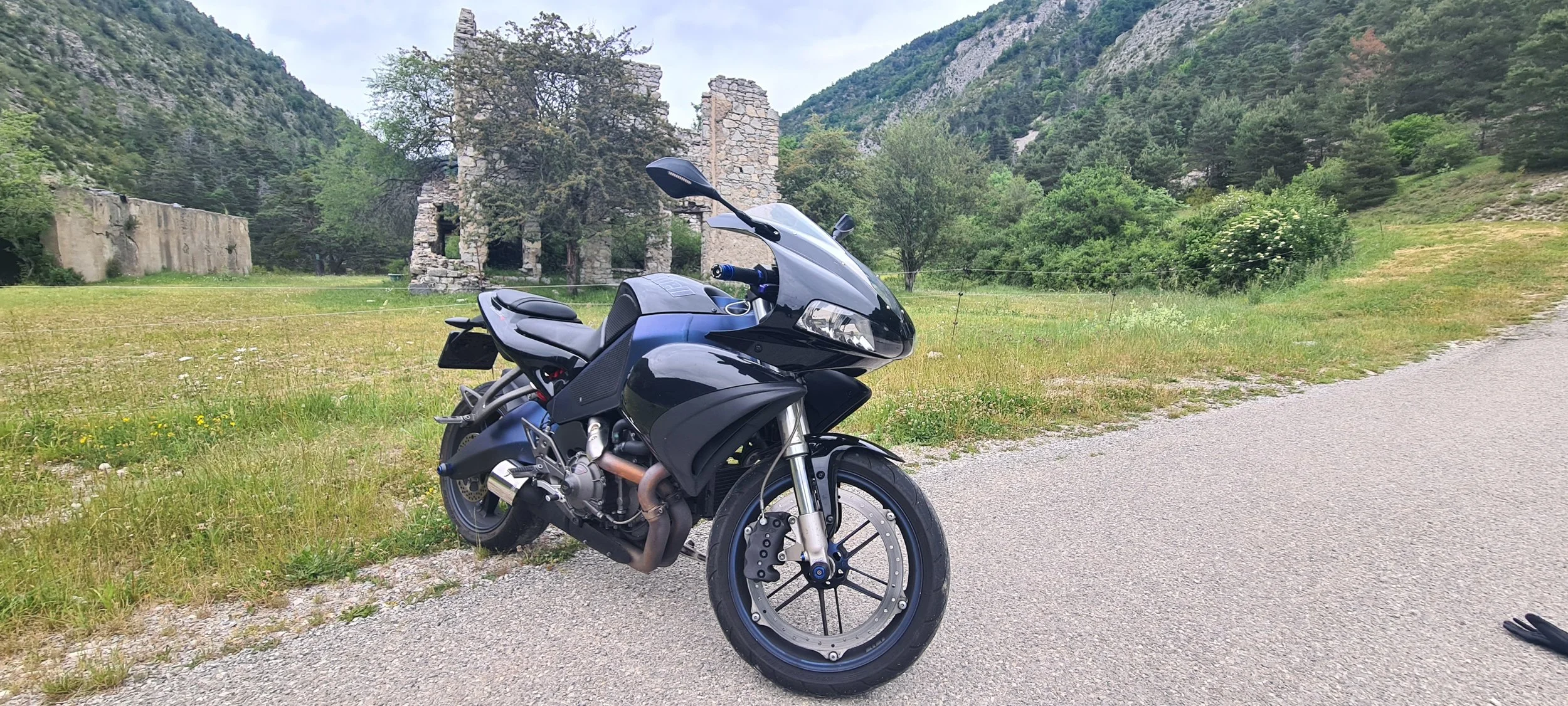 Buell in front of old house - France